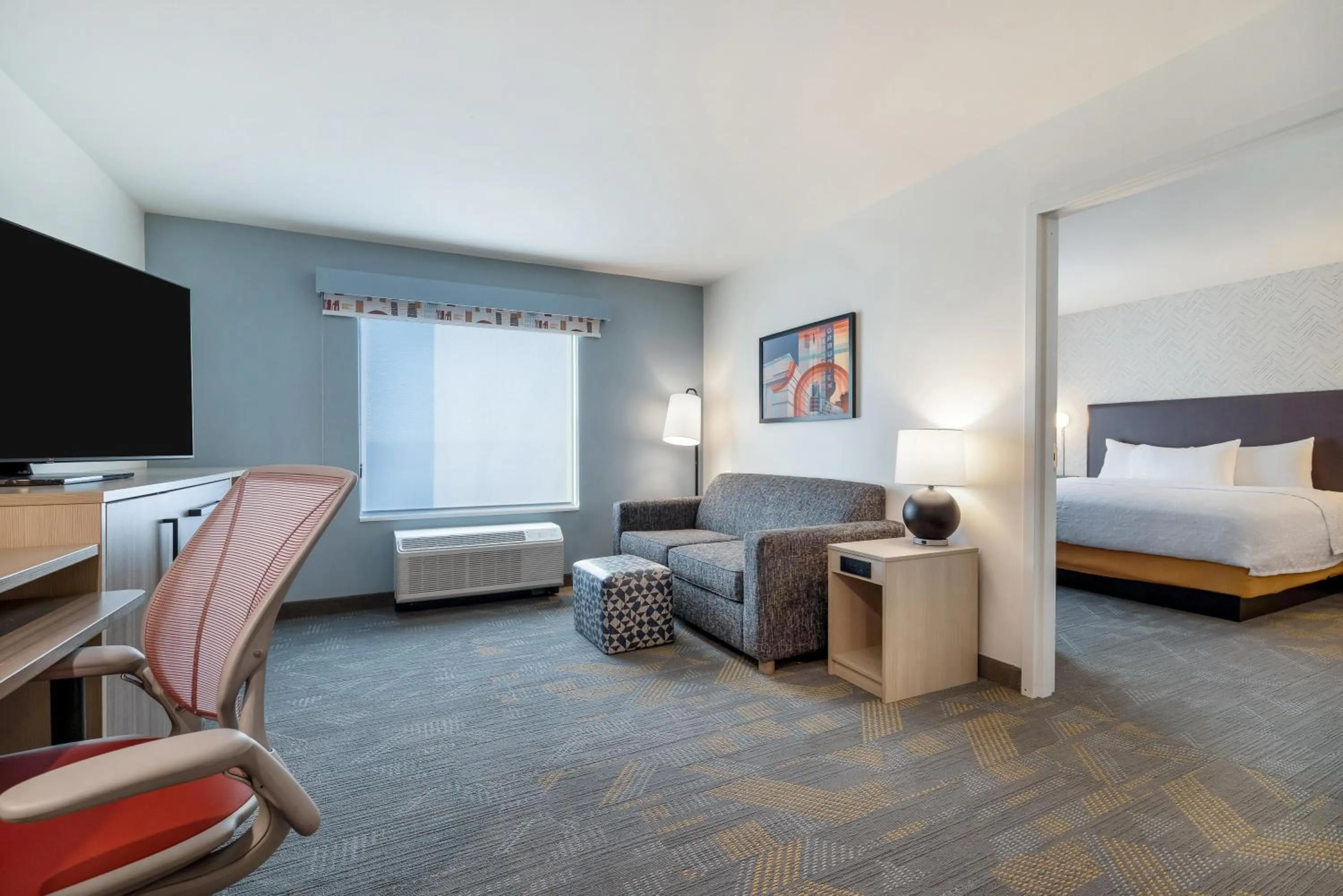 Living room, Bed in Home2 Suites By Hilton New Braunfels