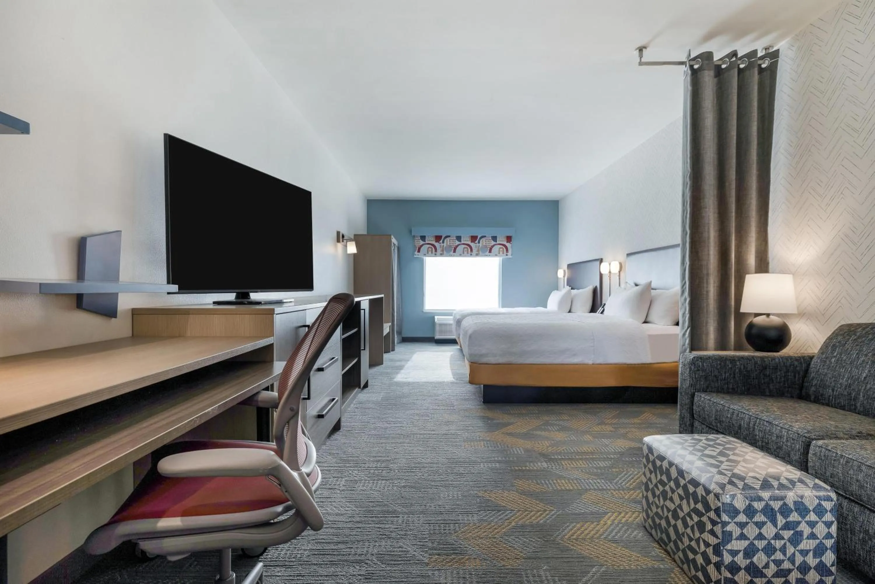 Living room, Bed in Home2 Suites By Hilton New Braunfels