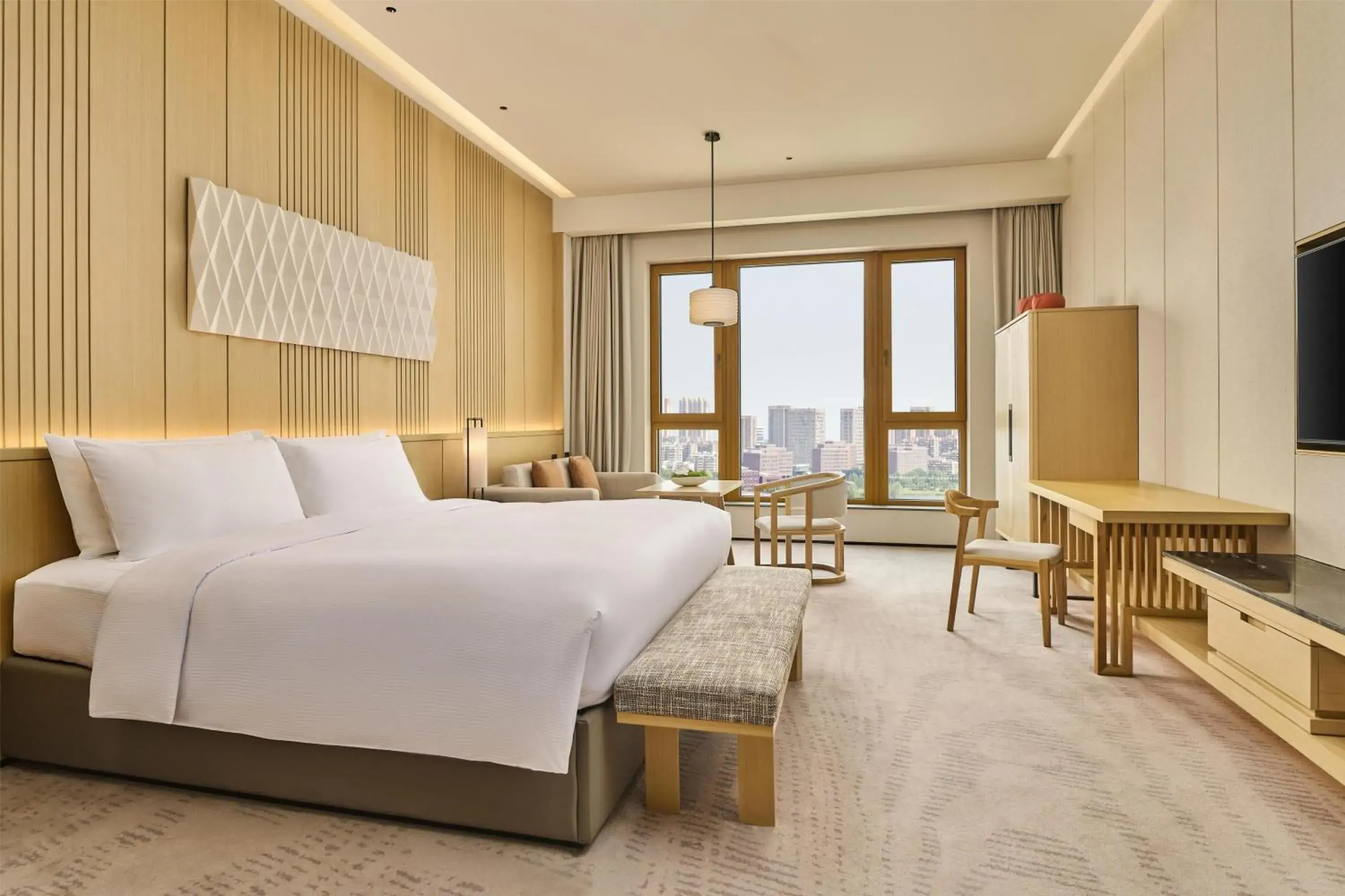 Bed in Secan Hotel Qingdao, Curio Collection By Hilton Bed in Secan Hotel Qingdao, Curio Collection By Hilton