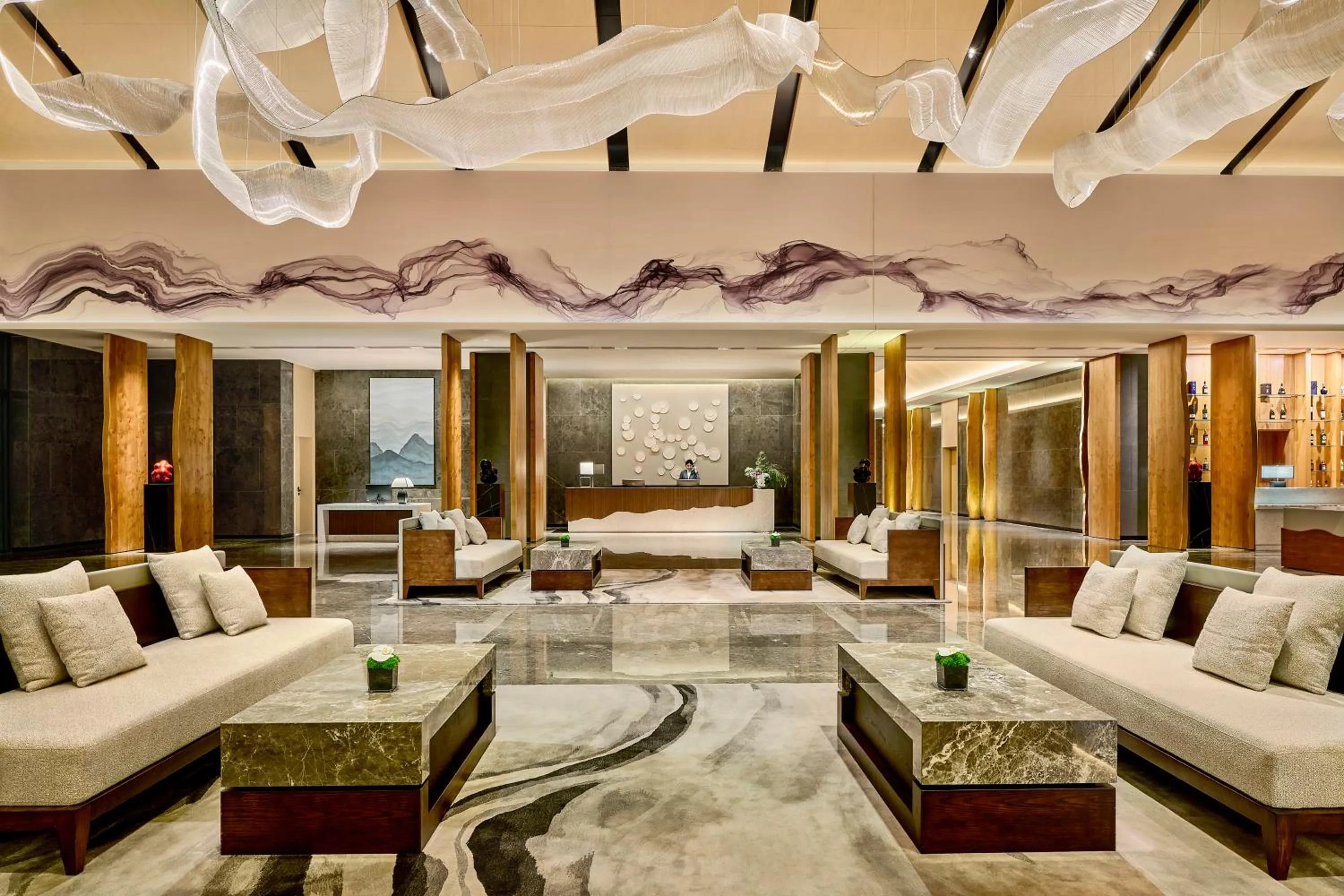 Lobby or reception in Secan Hotel Qingdao, Curio Collection By Hilton