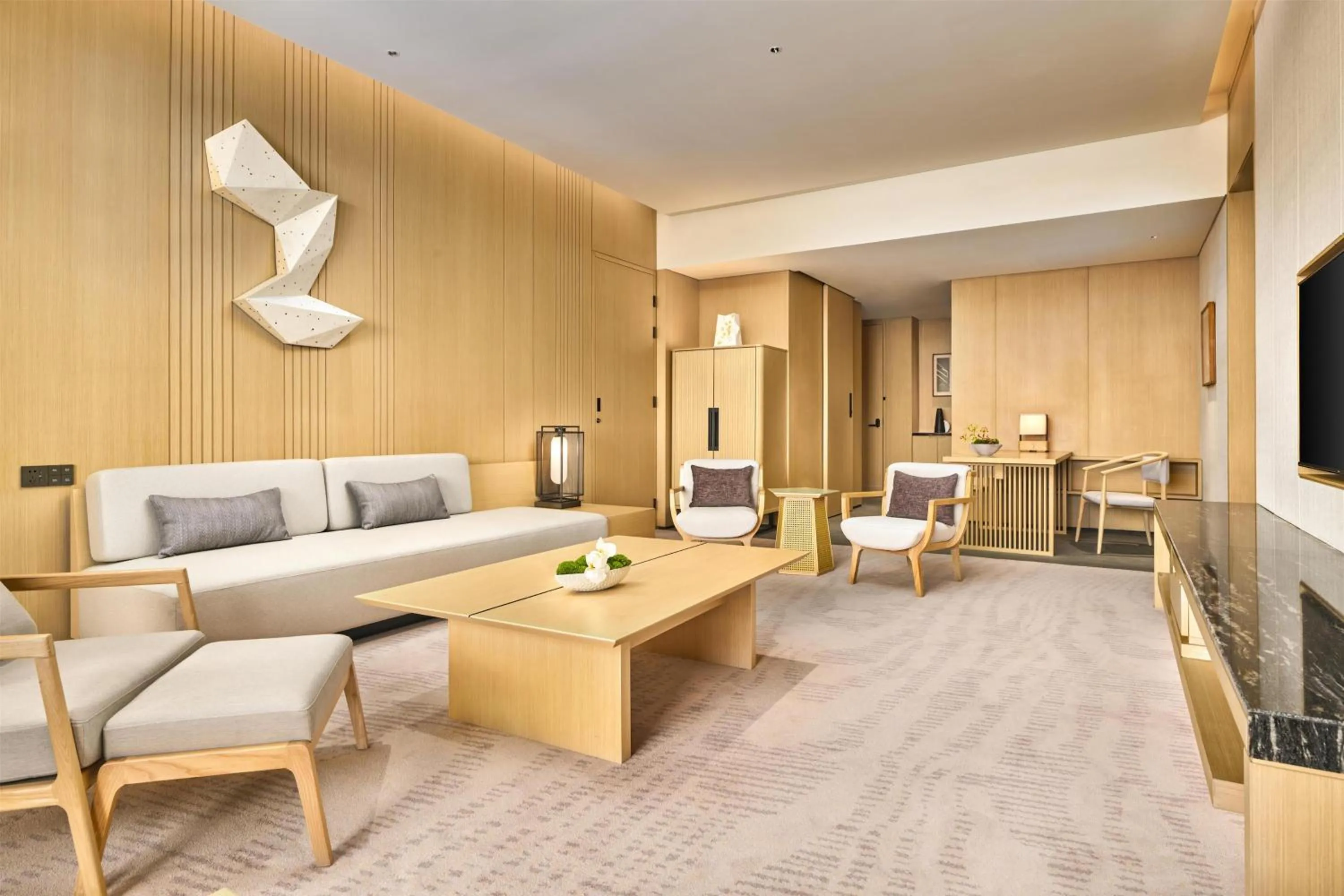 Living room in Secan Hotel Qingdao, Curio Collection By Hilton