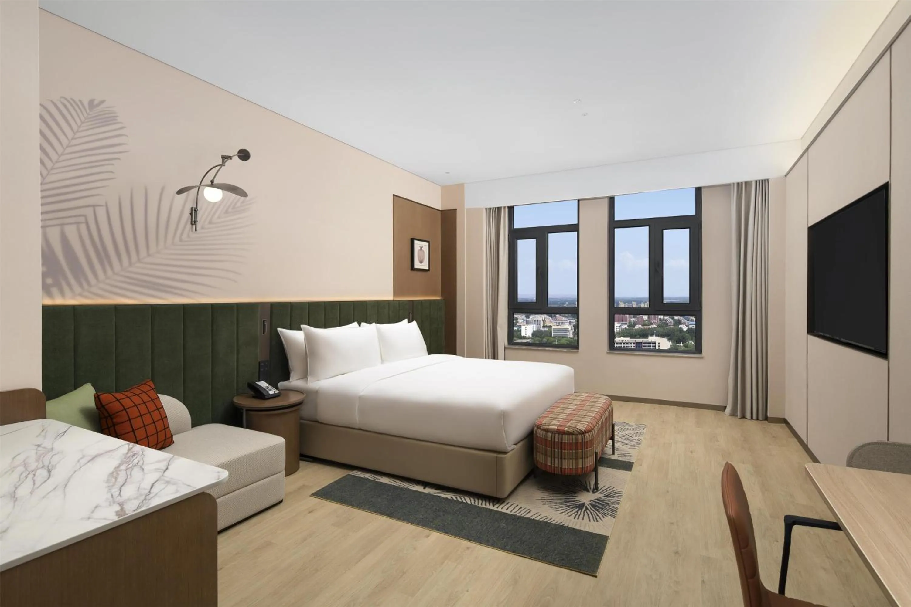 Living room, Bed in Hilton Garden Inn Zhongwei Shapotou