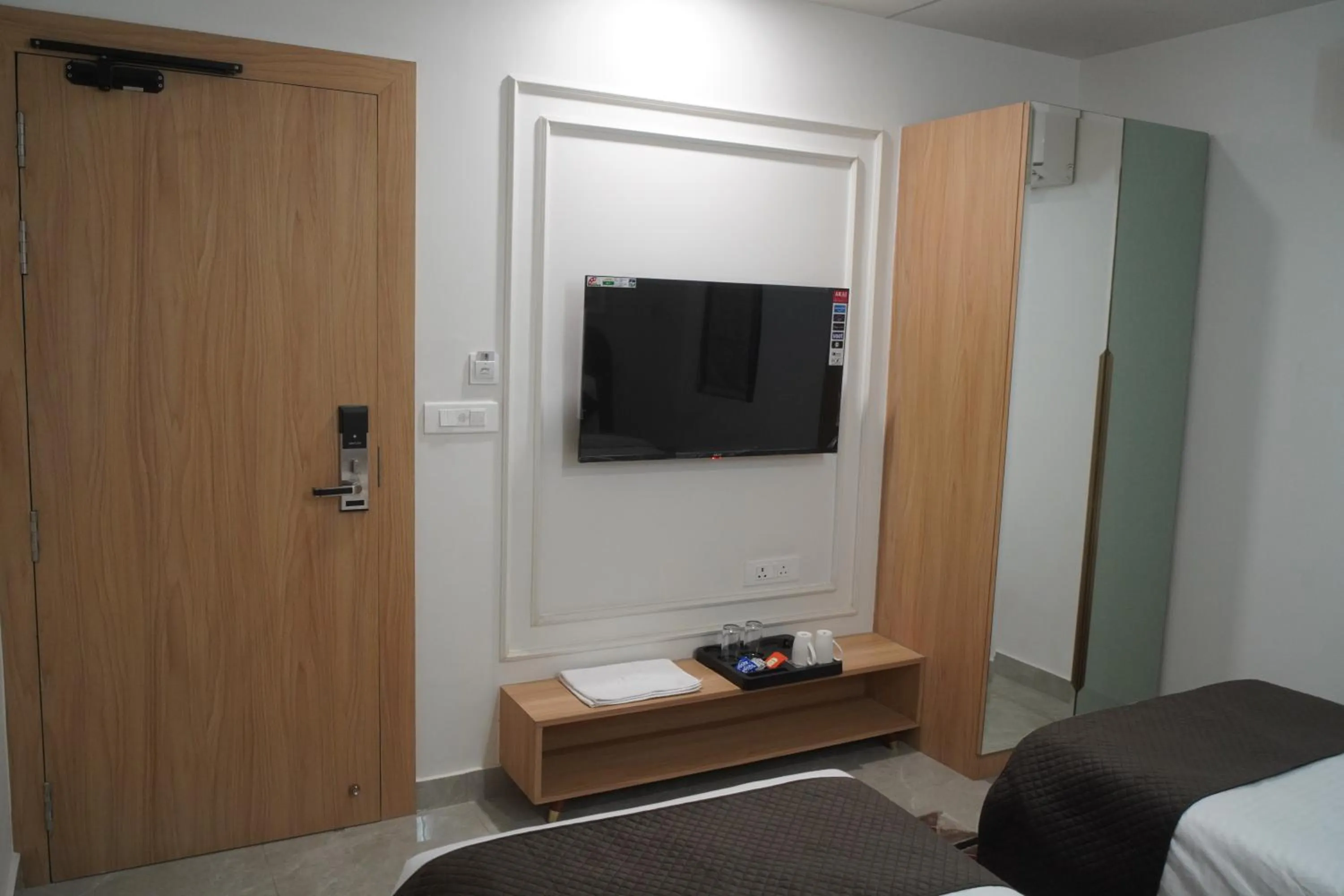 Communal lounge/ TV room, Bed in Ira Retreat Varanasi