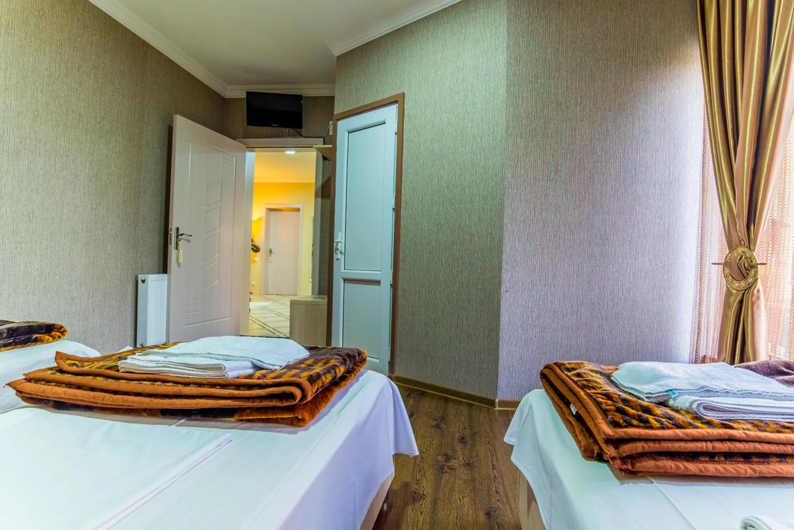 Bed in HOTEL GUGLUX &WINE CELLAR