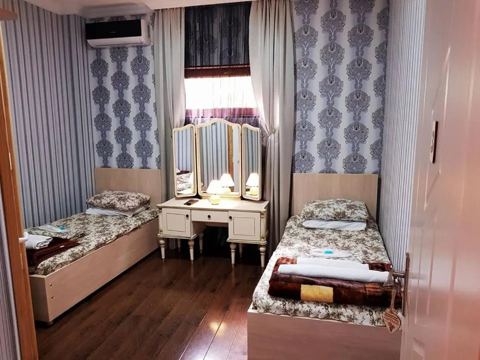 Bed in HOTEL GUGLUX &WINE CELLAR