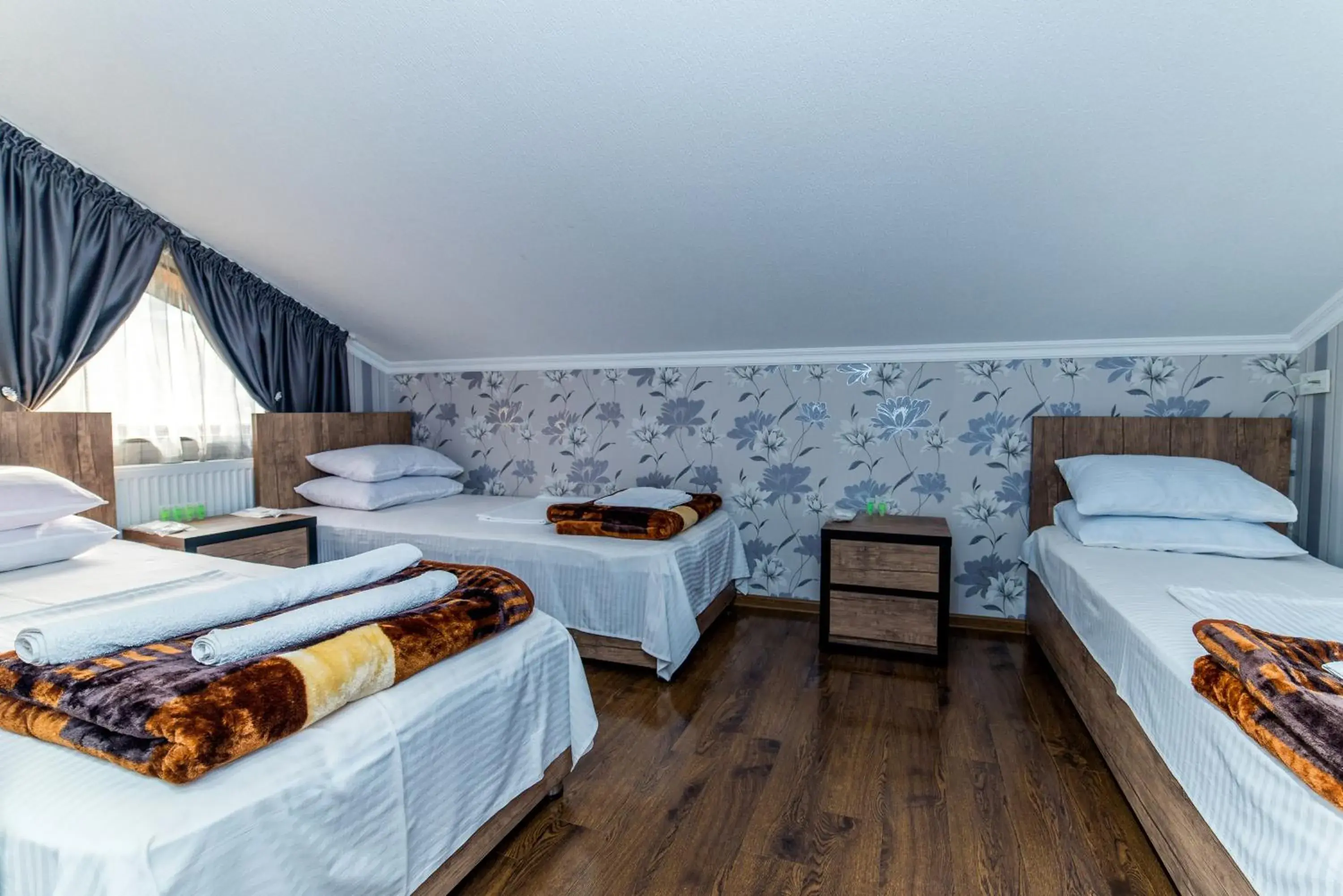 Triple Room in HOTEL GUGLUX &WINE CELLAR Triple Room in HOTEL GUGLUX &WINE CELLAR