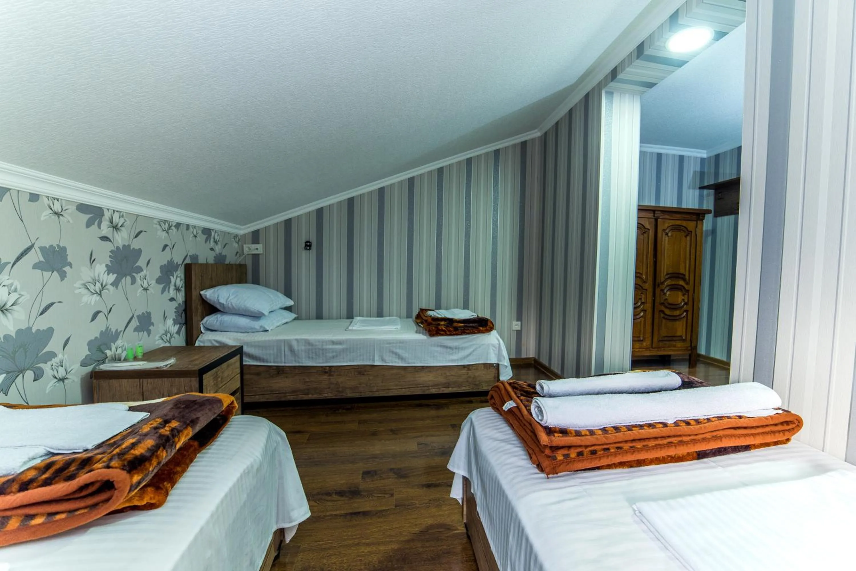 Bed in HOTEL GUGLUX &WINE CELLAR