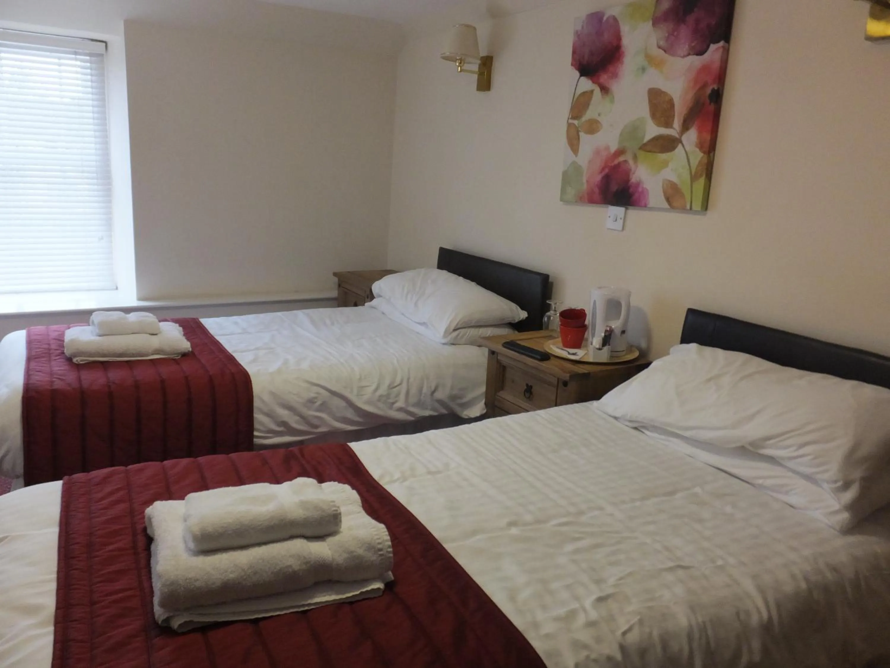 Bed in Novar Arms Hotel