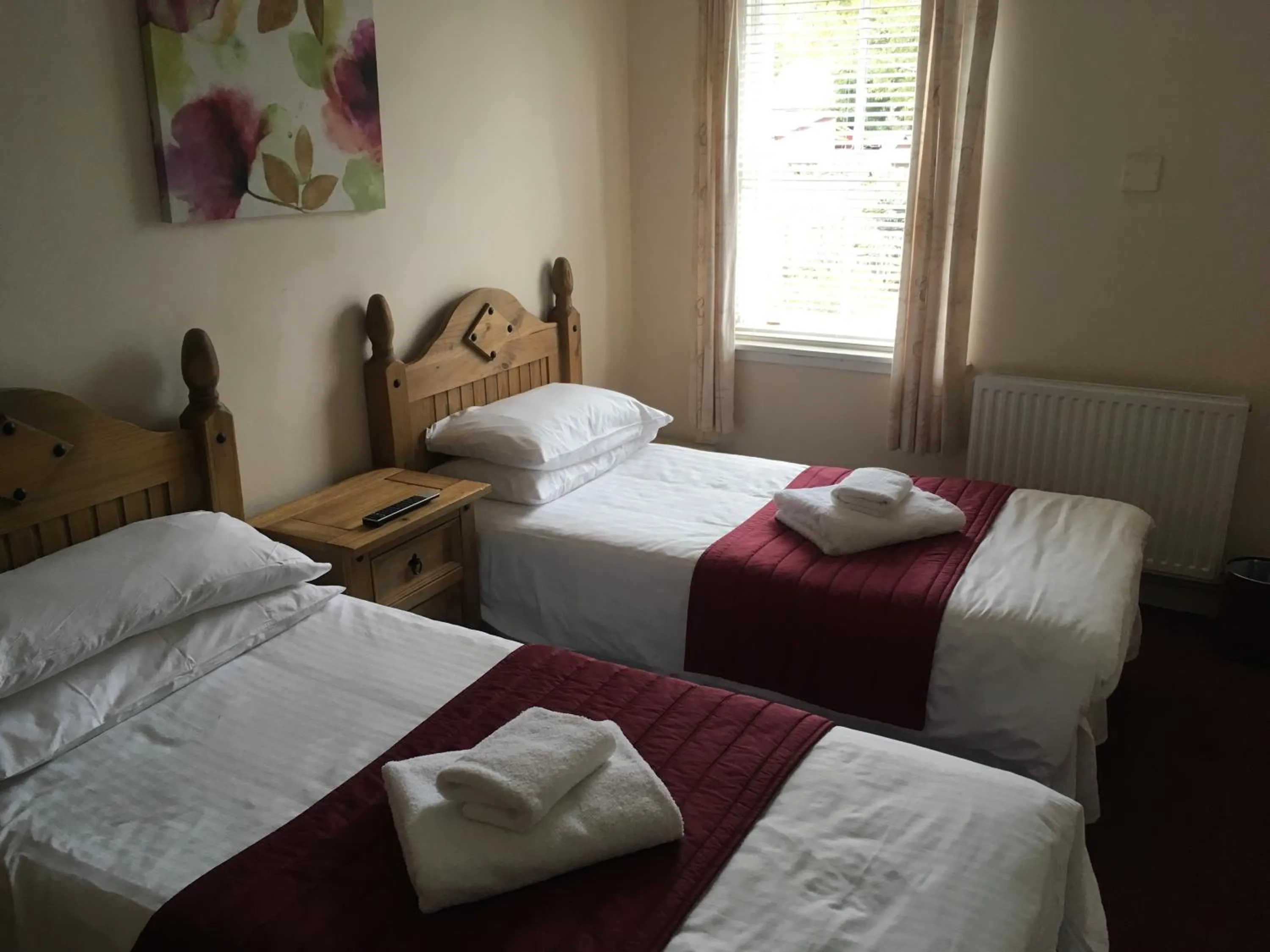 Bed in Novar Arms Hotel