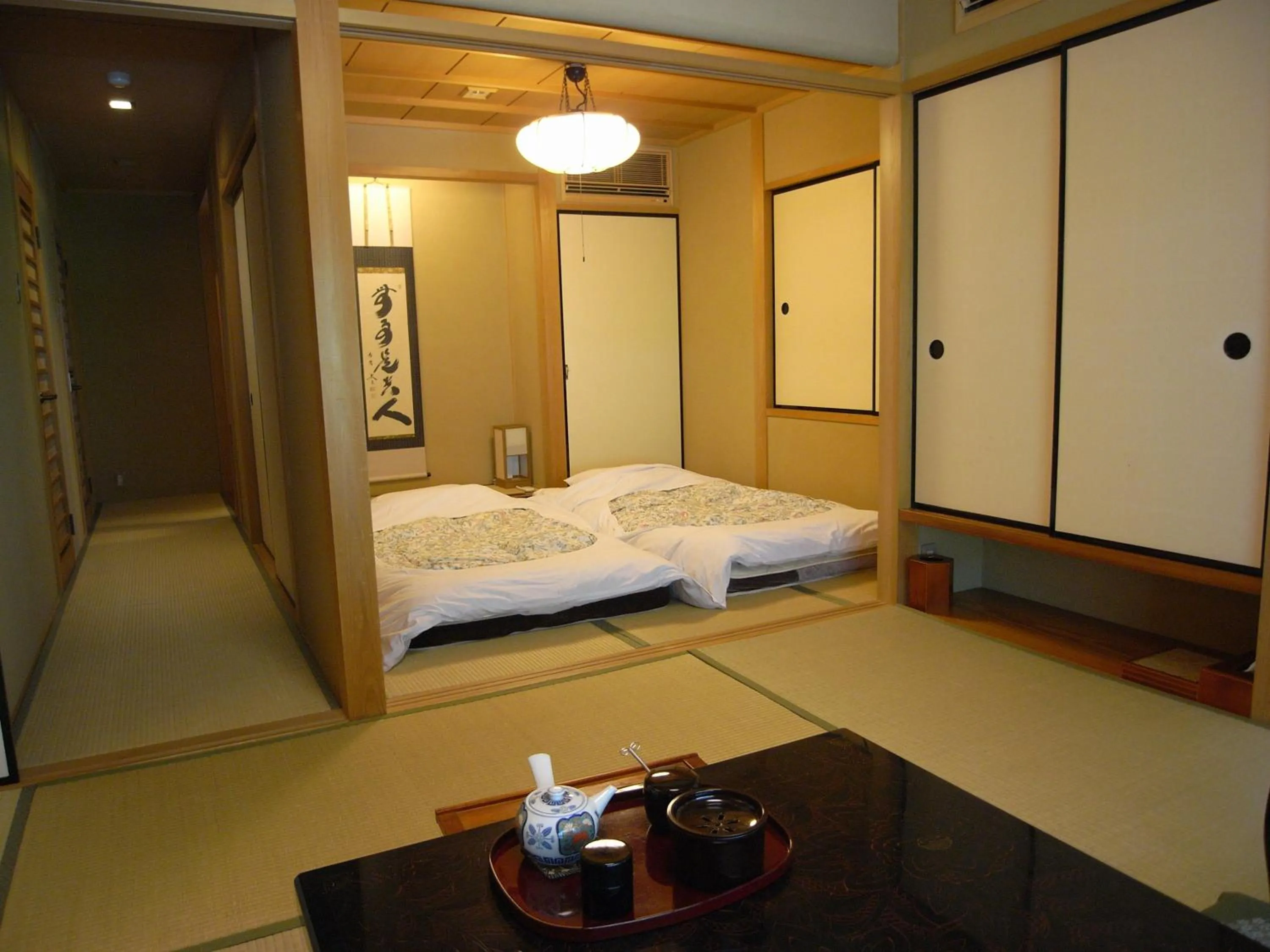 Photo of the whole room, Bed in Kawakamiya Kasuitei
