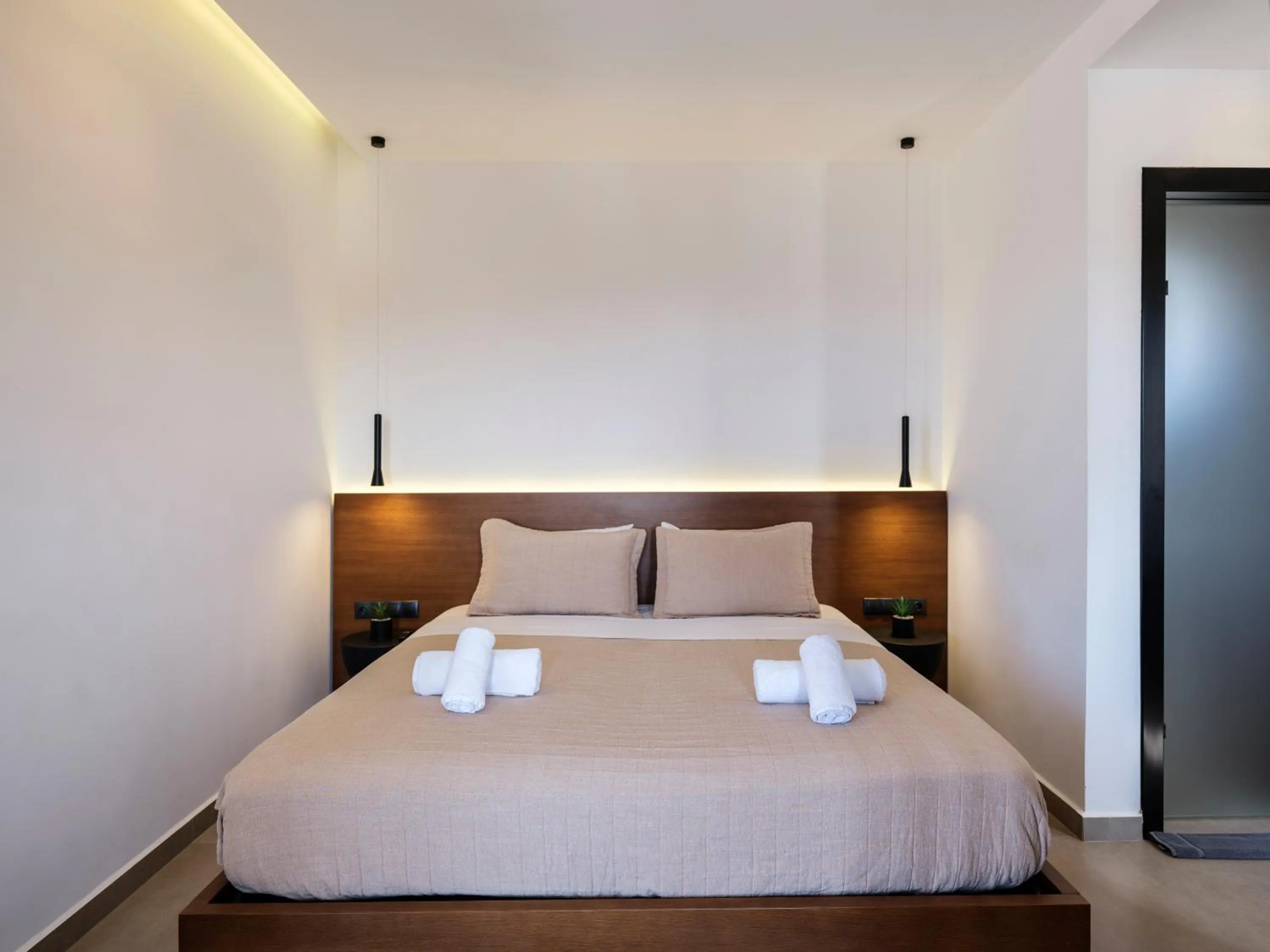 Bed in Evi Suites & Villas