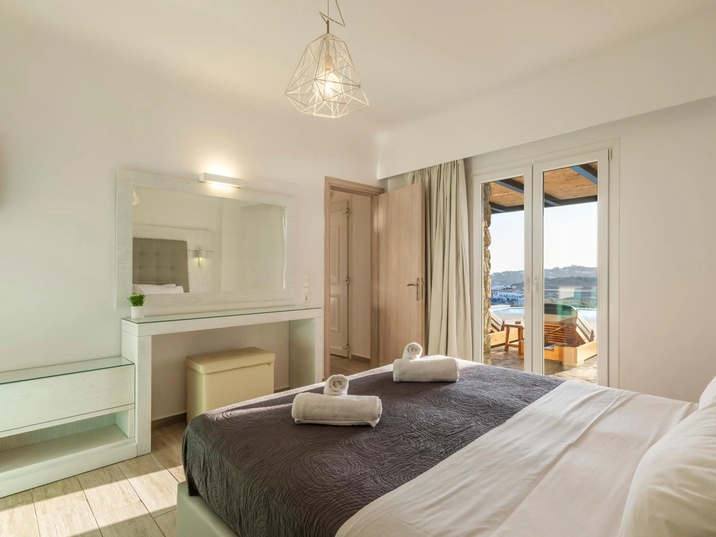 Bed in Evi Suites & Villas