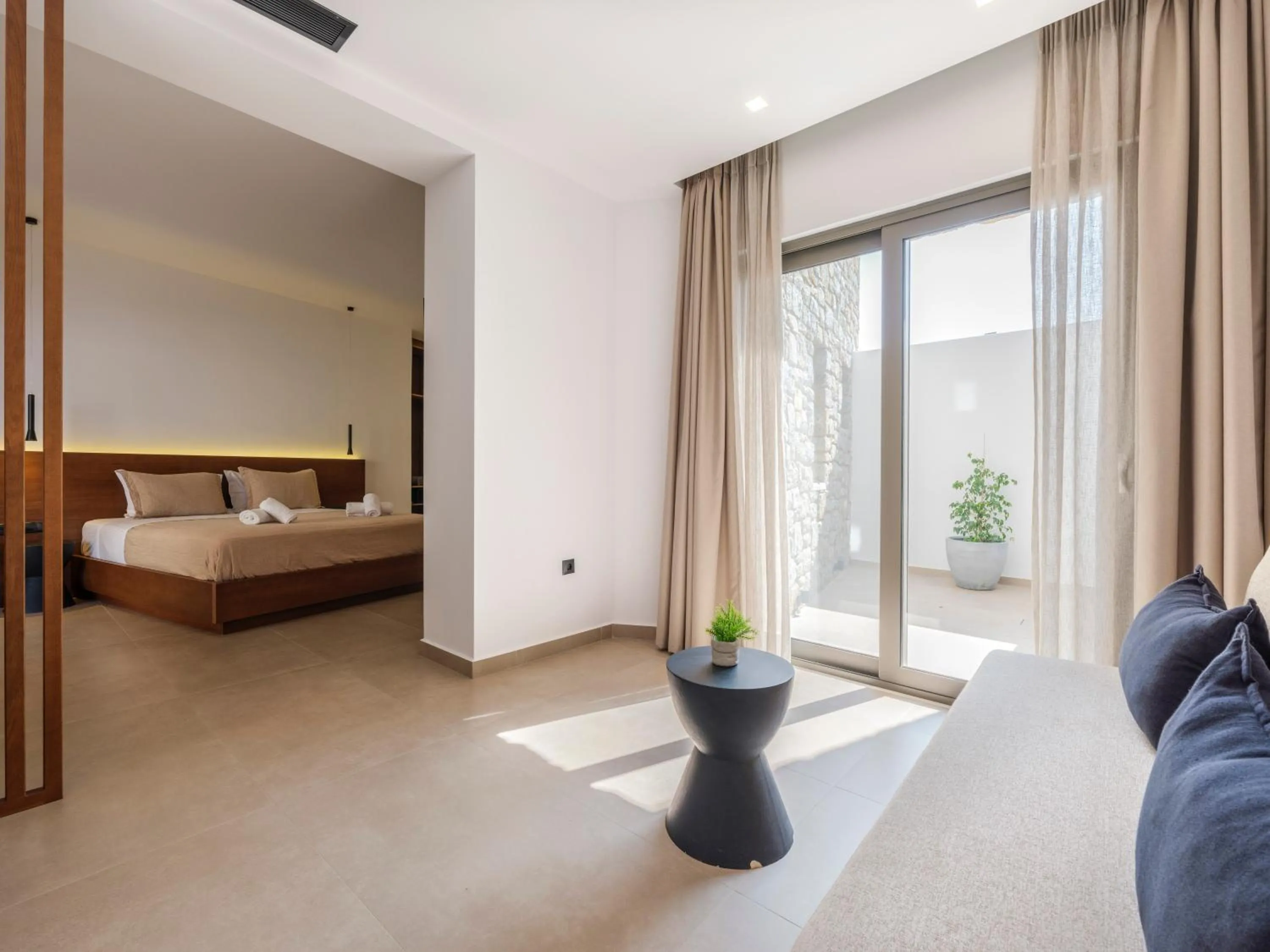 Bed in Evi Suites & Villas