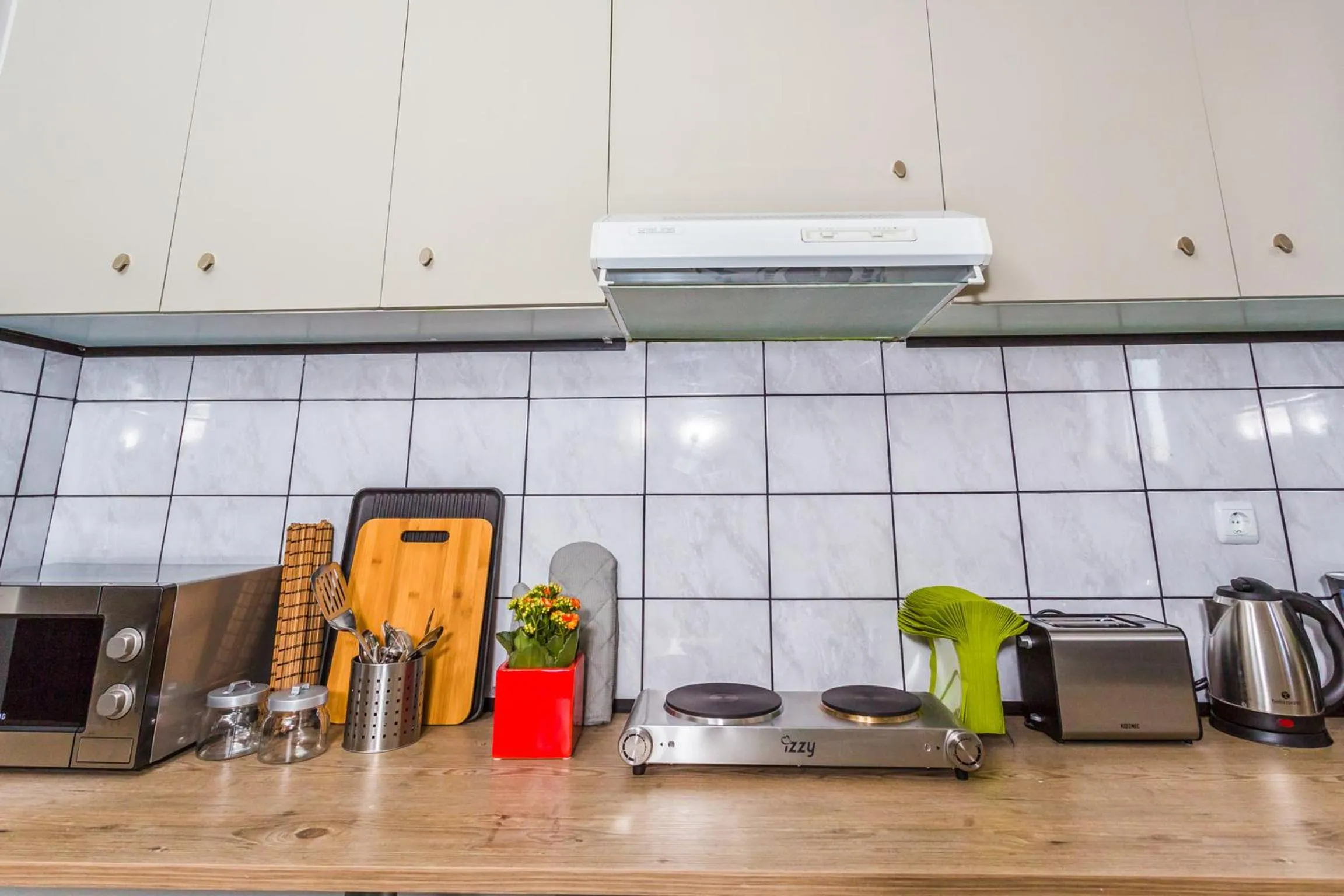 Kitchen or kitchenette in Aris Athens Suites