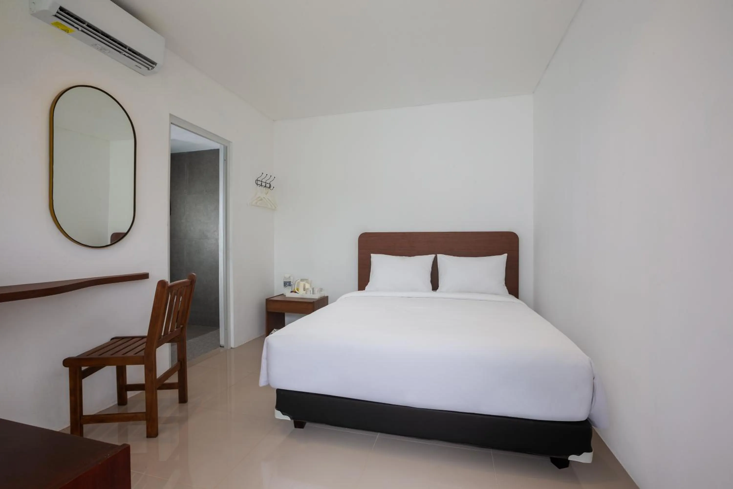 Bed in Casa de Lani Resort & Convention