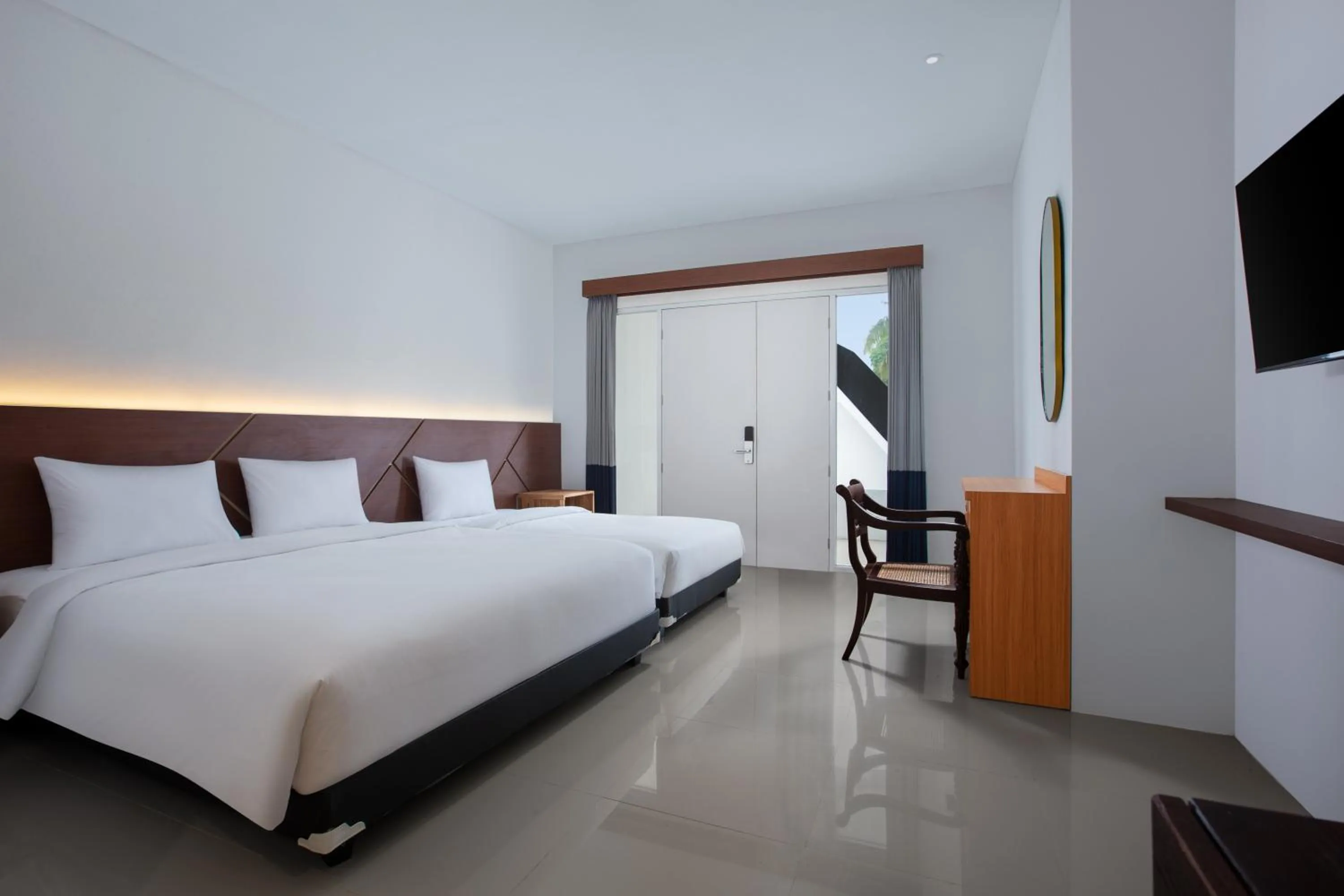 Bed in Casa de Lani Resort & Convention