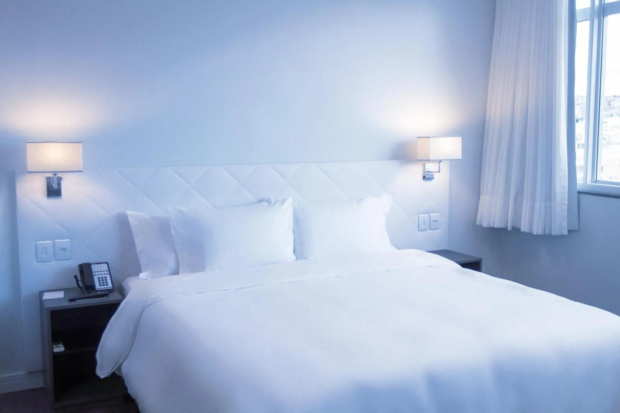 Bed in Fratele Business Hotel