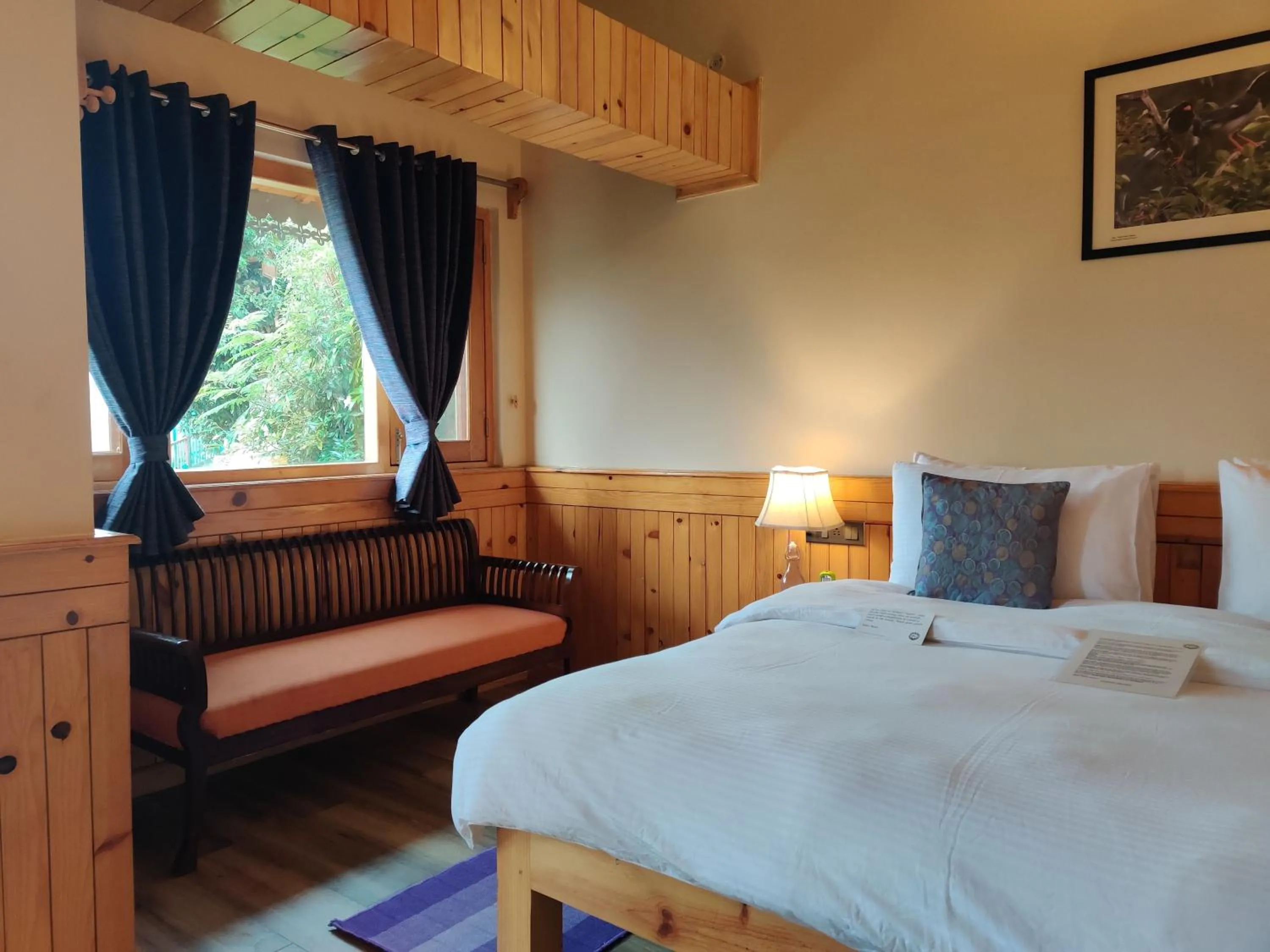 Bed in Parvada Bungalows