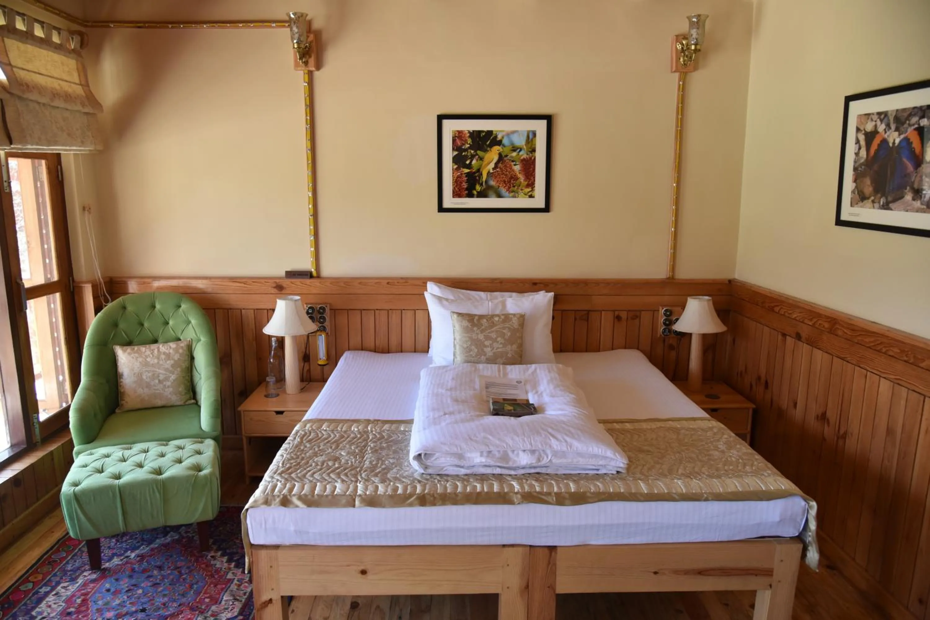 Bed in Parvada Bungalows