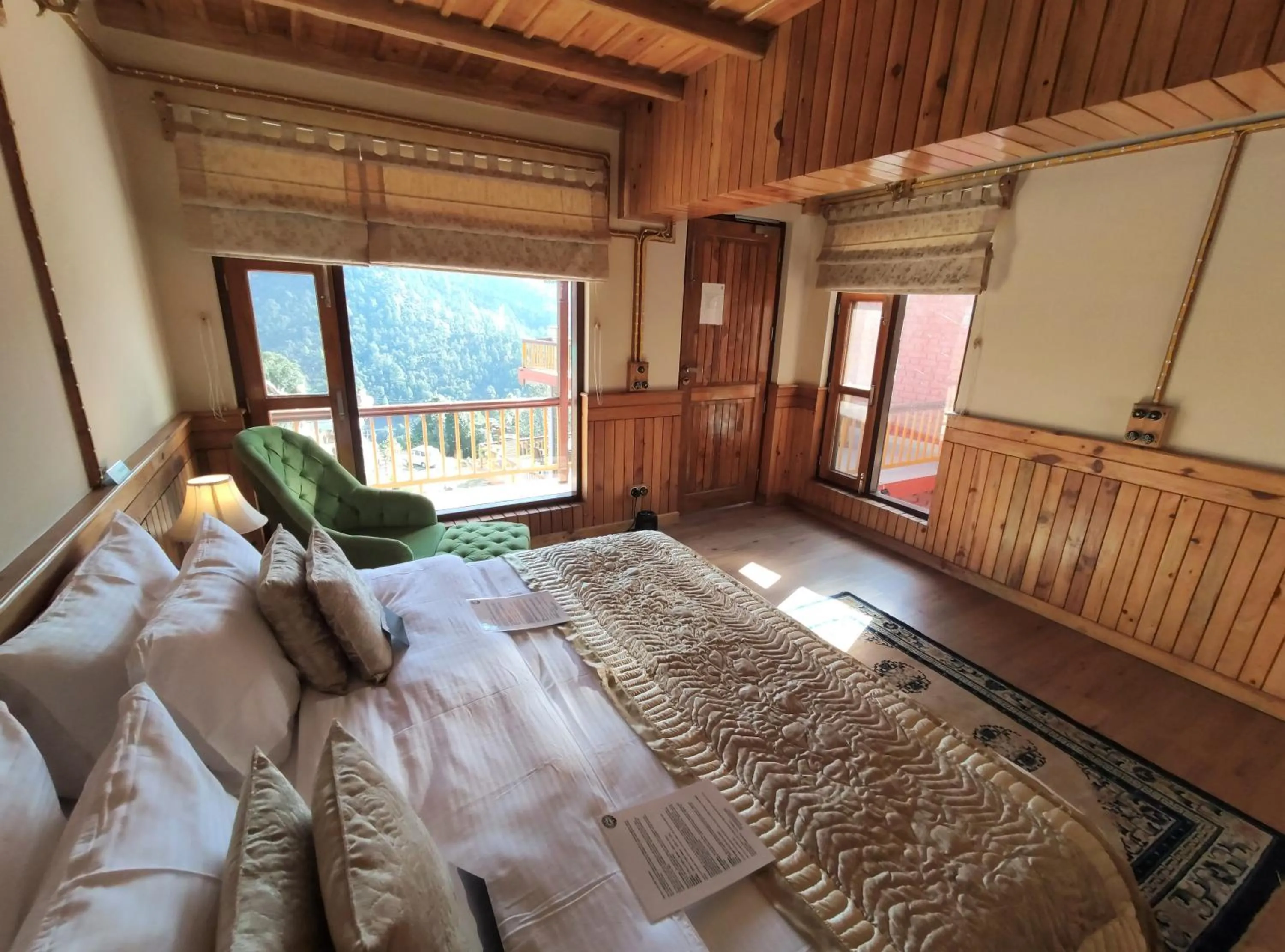 Bed in Parvada Bungalows