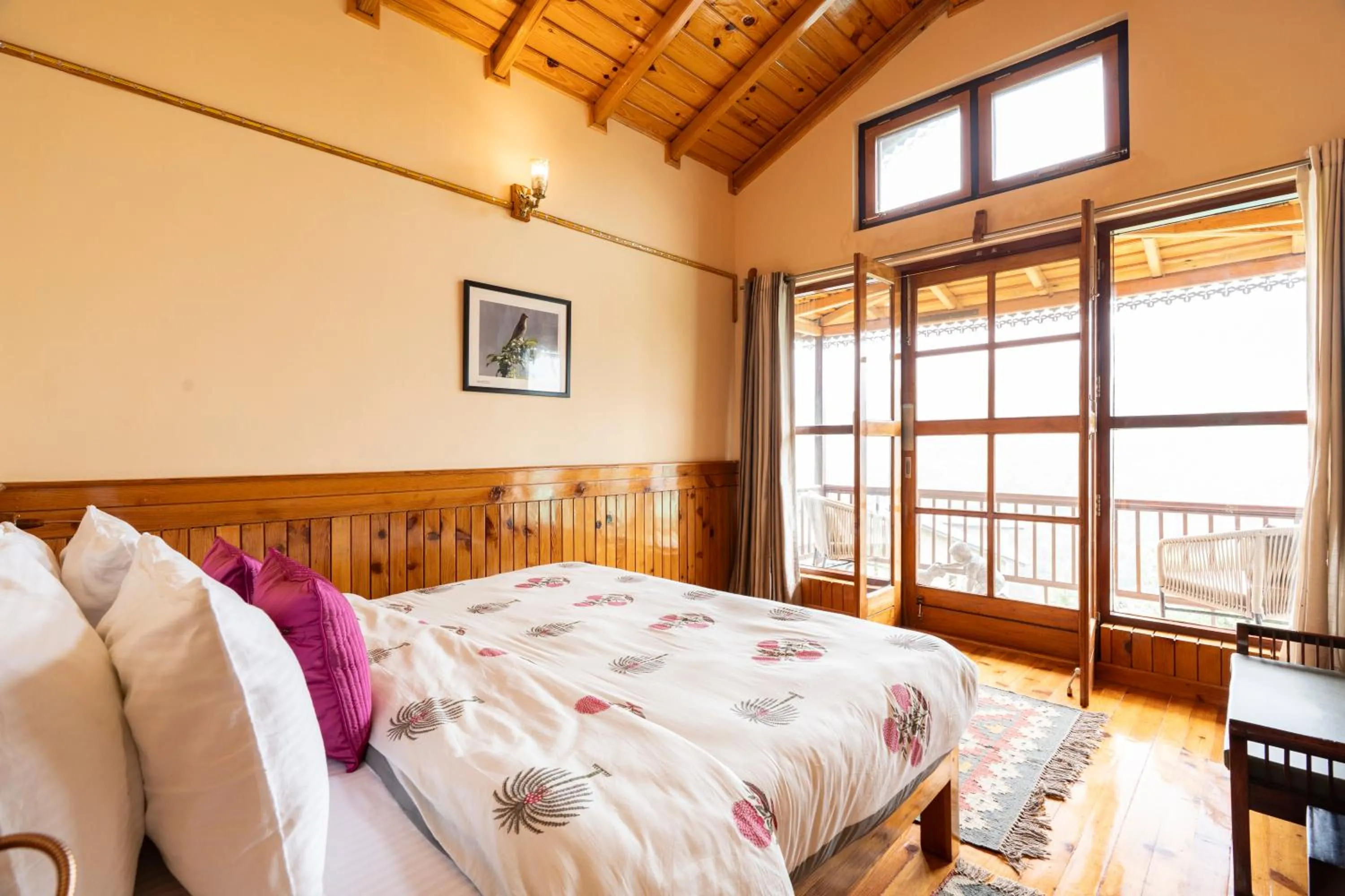 Bed in Parvada Bungalows