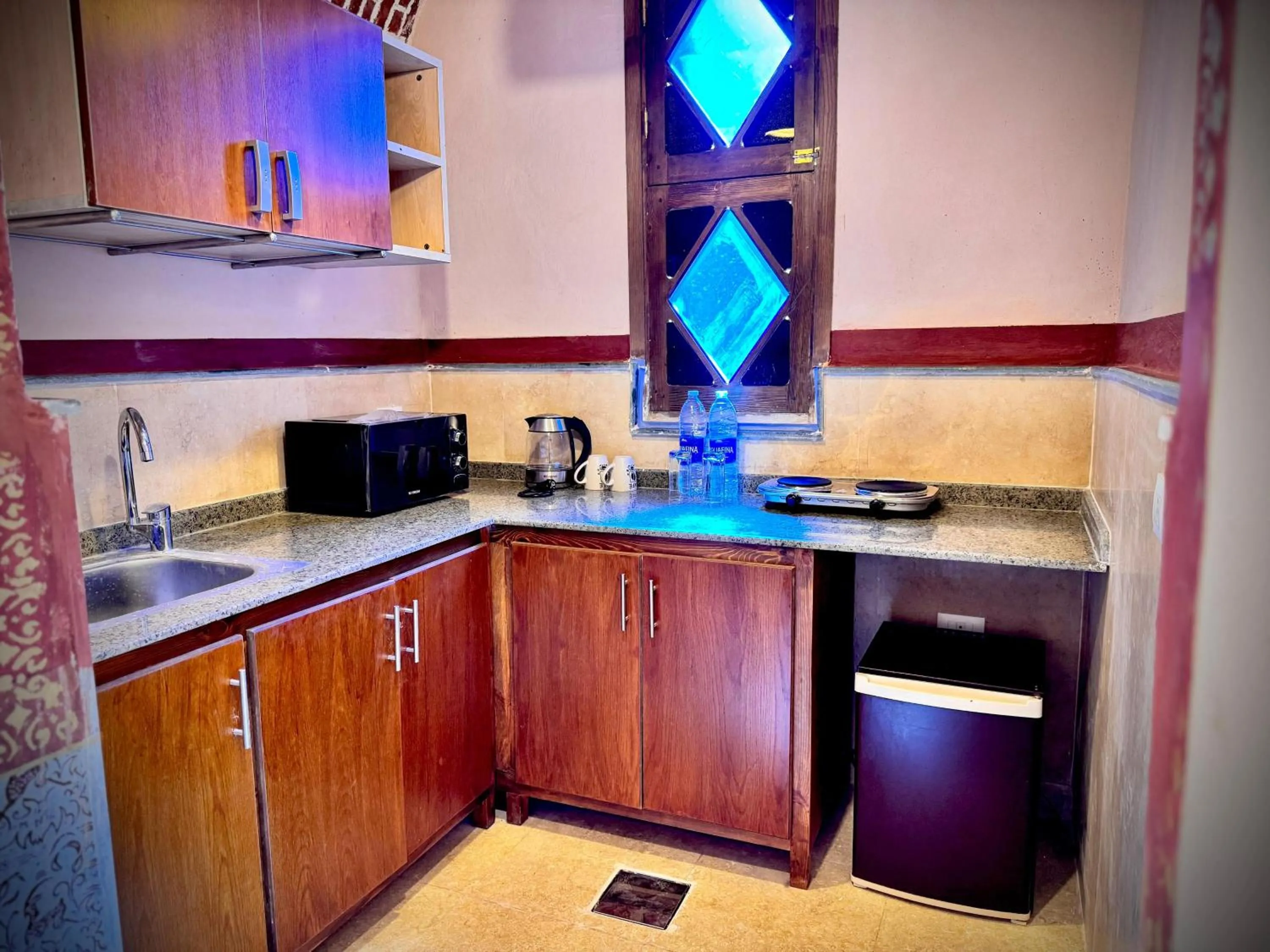 Kitchen or kitchenette in El Juneina Villas