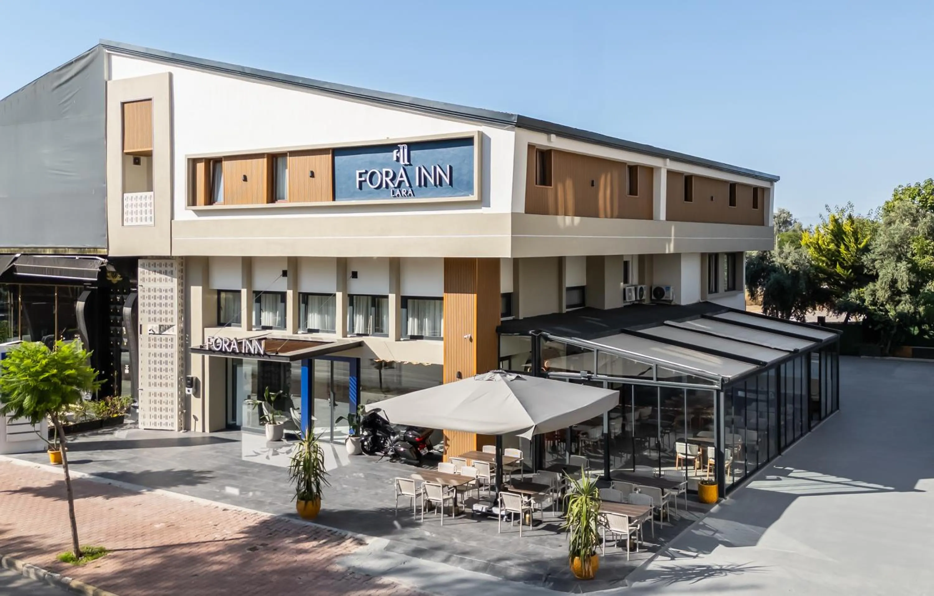 Property building in Fora Inn Lara