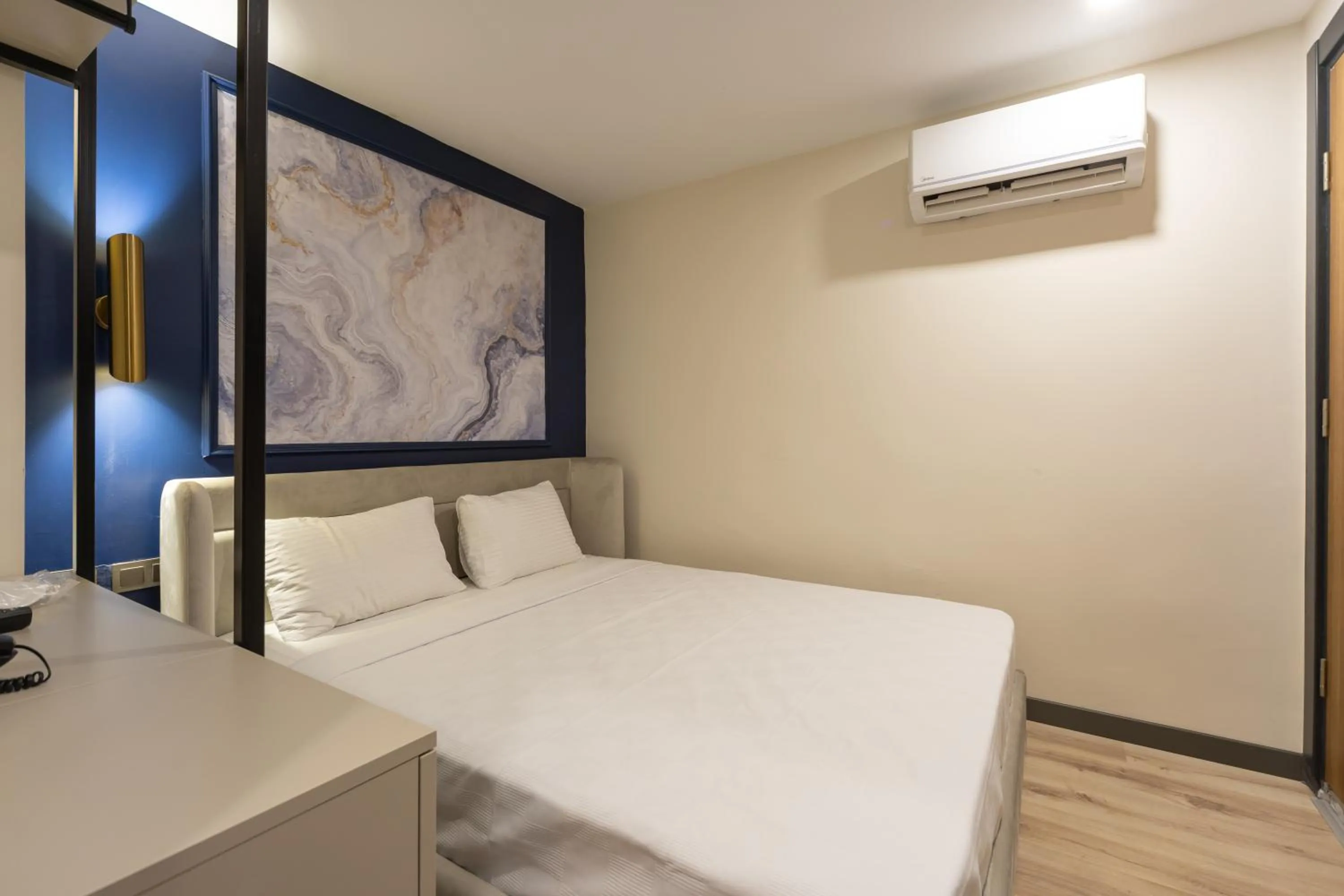 Photo of the whole room, Bed in Fora Inn Lara