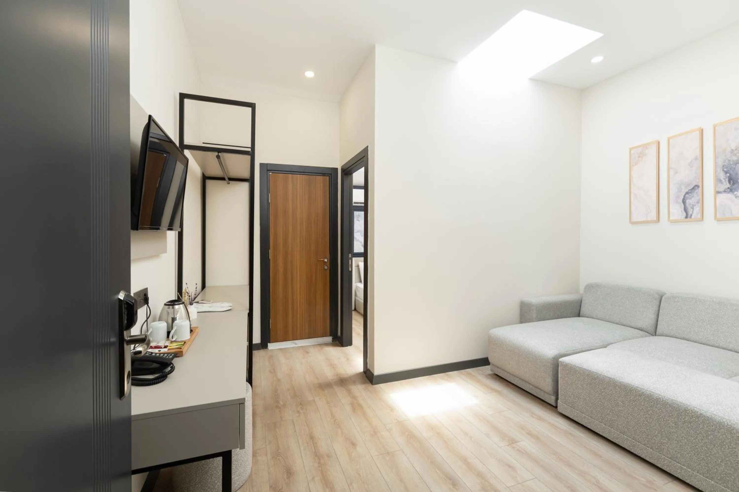 Living room, Bed in Fora Inn Lara