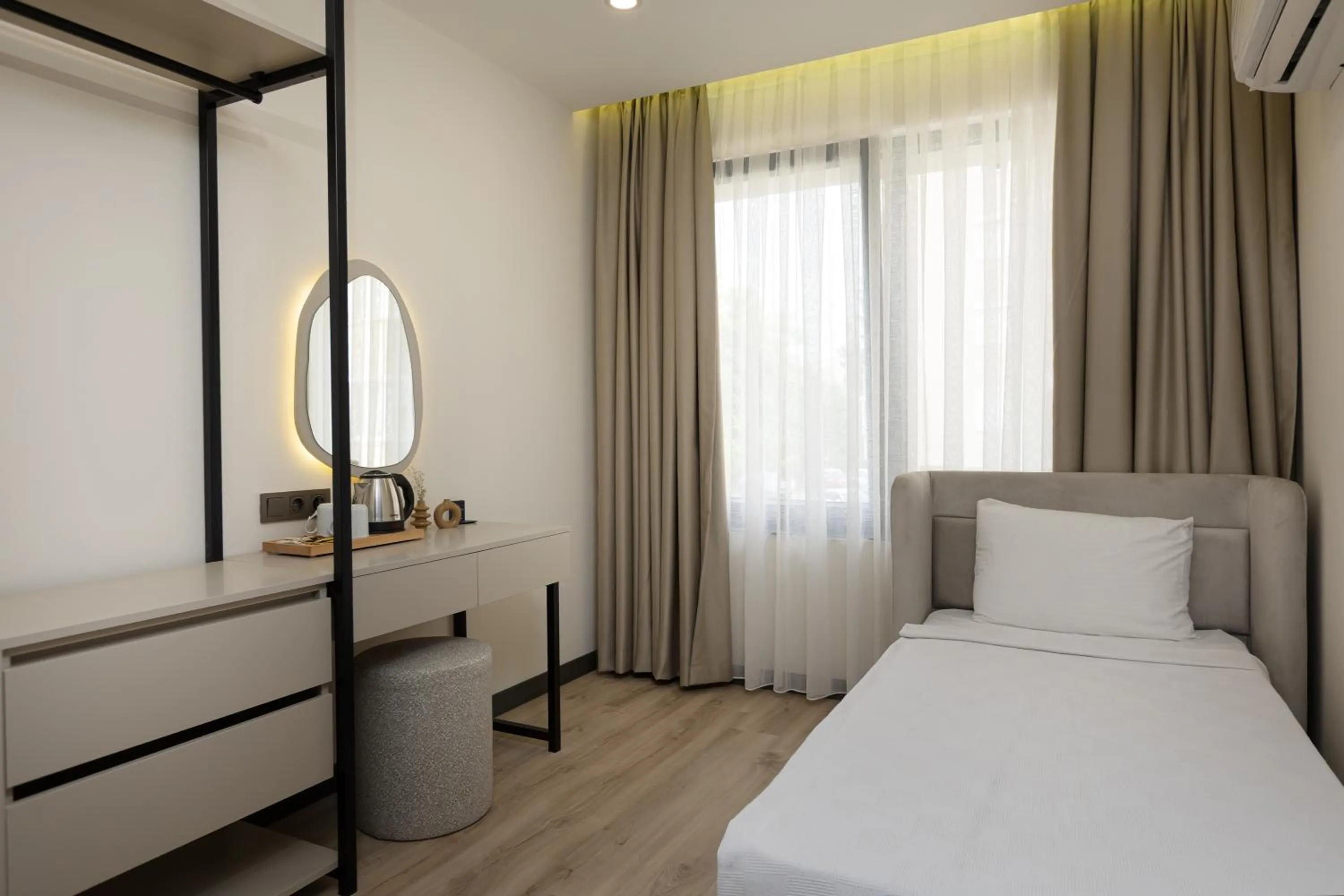 Bed in Fora Inn Lara