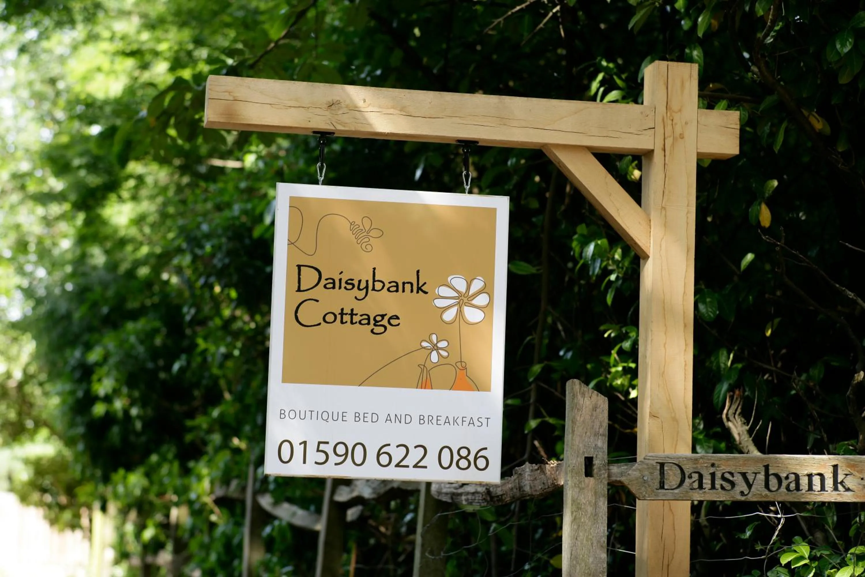 Property logo or sign in Daisybank Cottage Boutique Bed and Breakfast