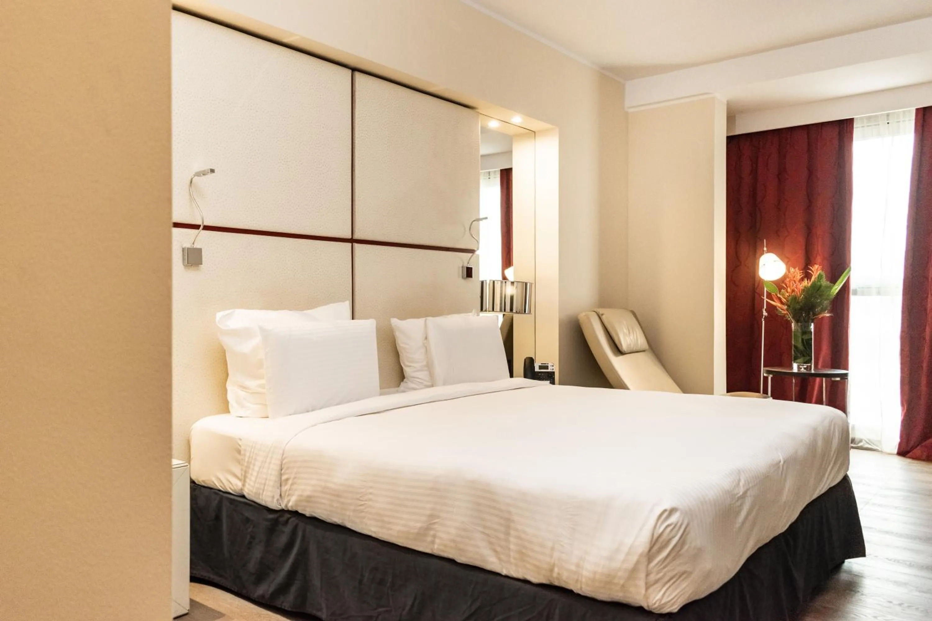 Bed in Pullman Kinshasa Grand Hotel