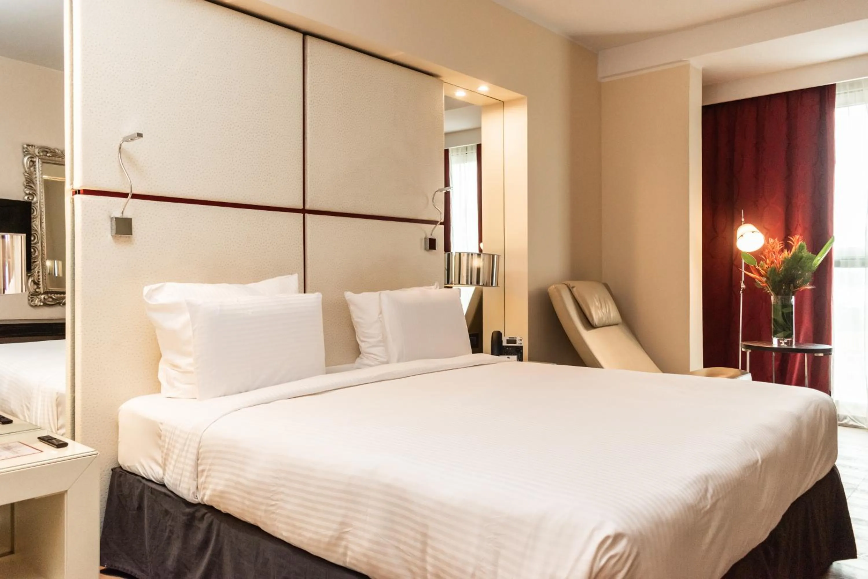 Bed in Pullman Kinshasa Grand Hotel