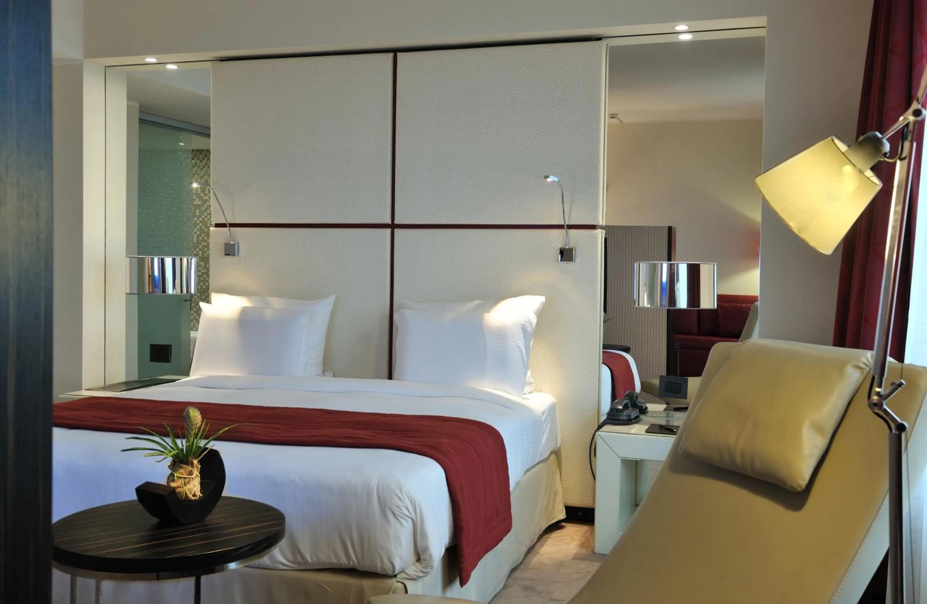 Bed in Pullman Kinshasa Grand Hotel