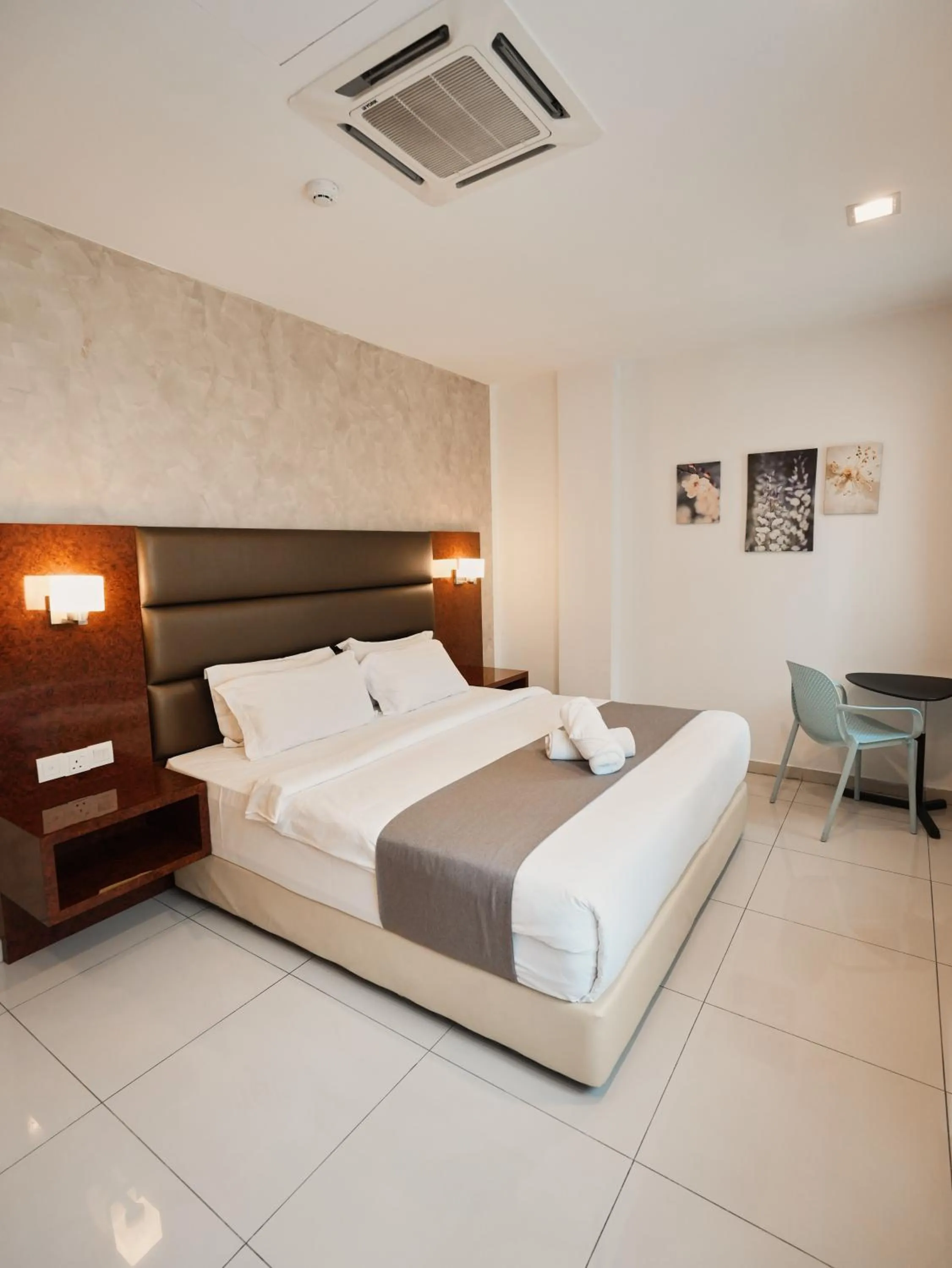 Bed in Eco Roomy Hotel