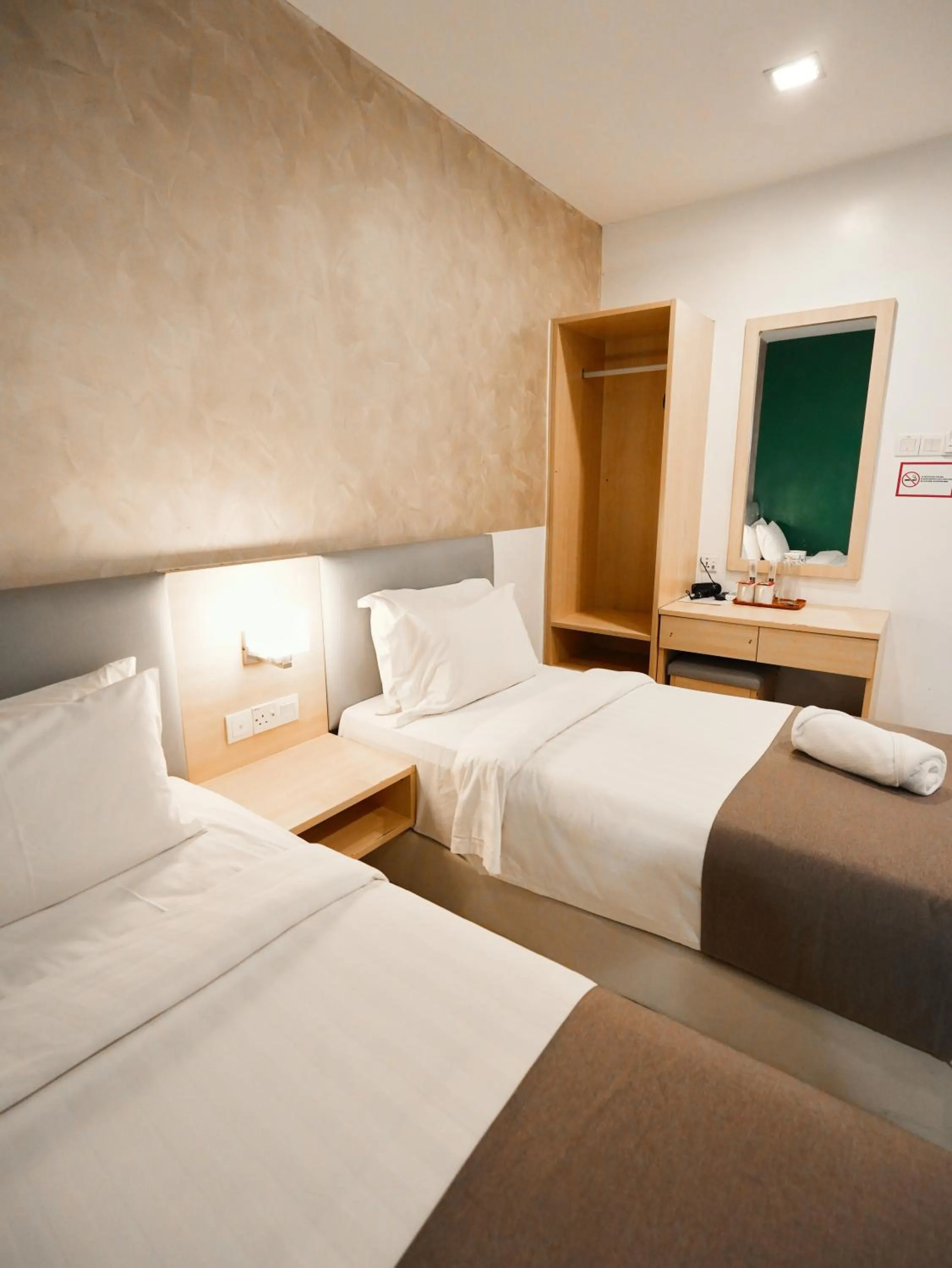 Bed in Eco Roomy Hotel