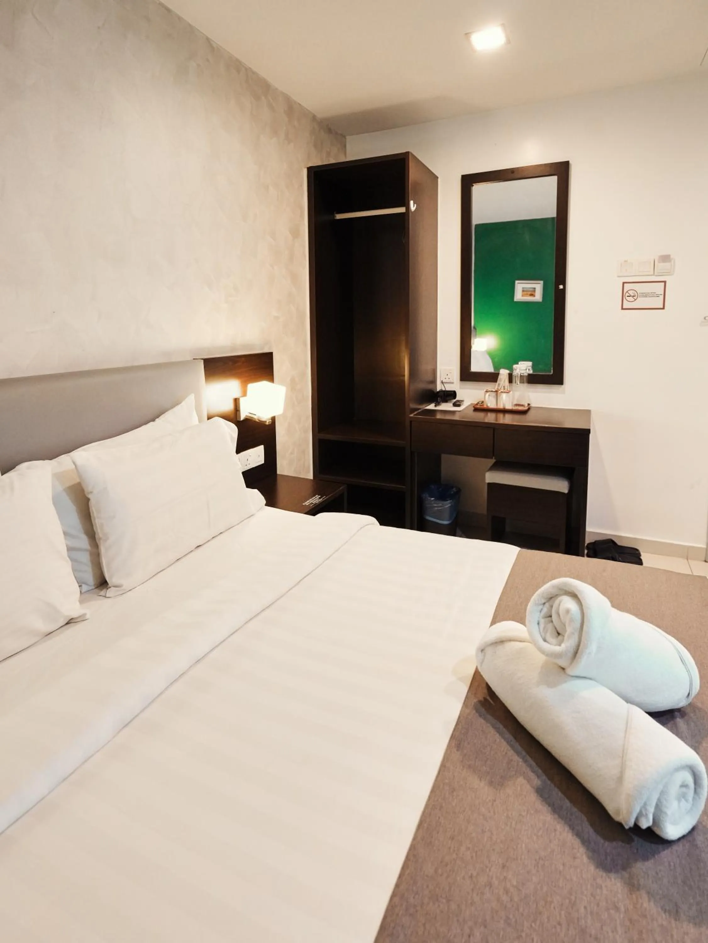 Bed in Eco Roomy Hotel