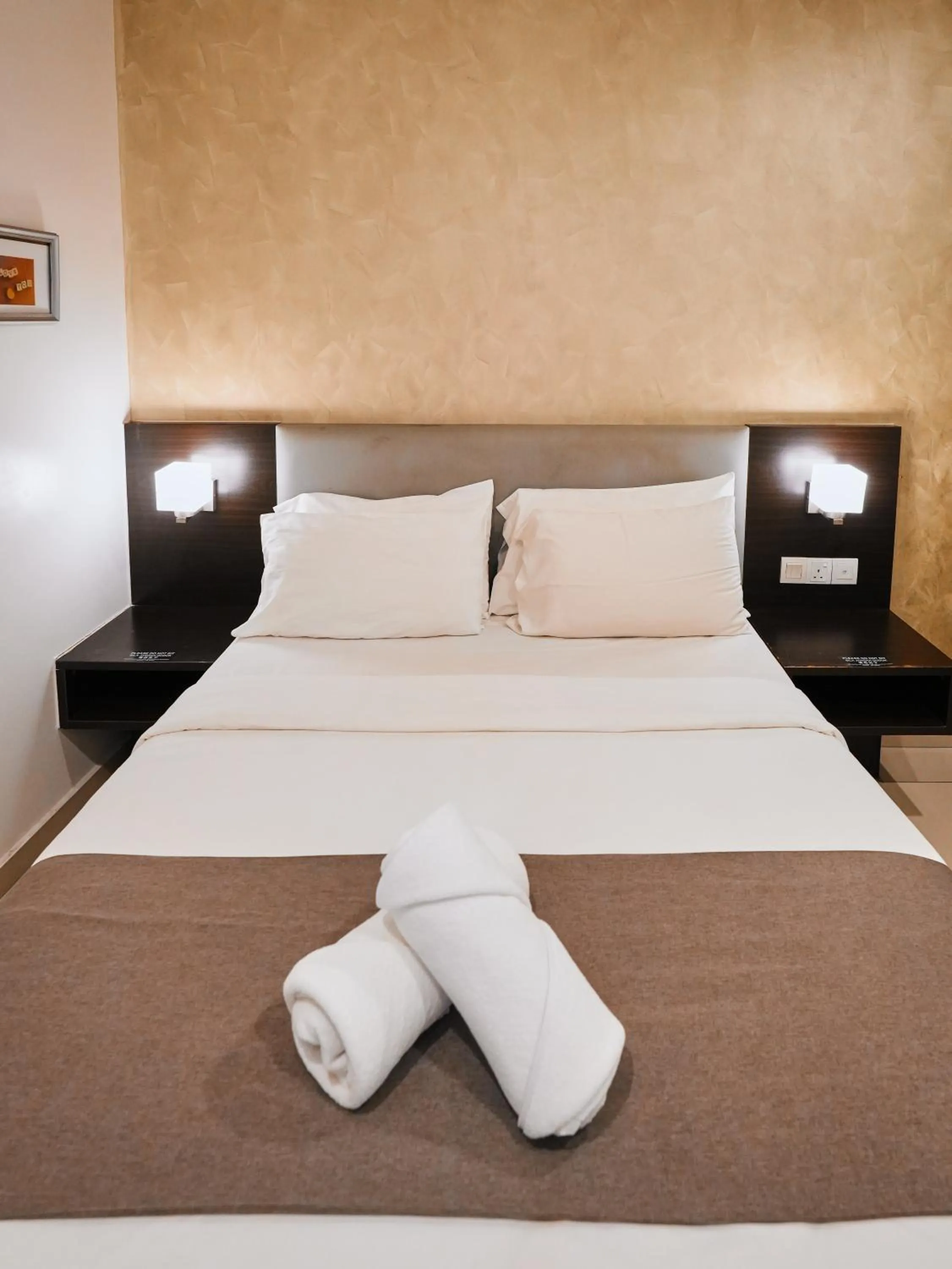 Bed in Eco Roomy Hotel