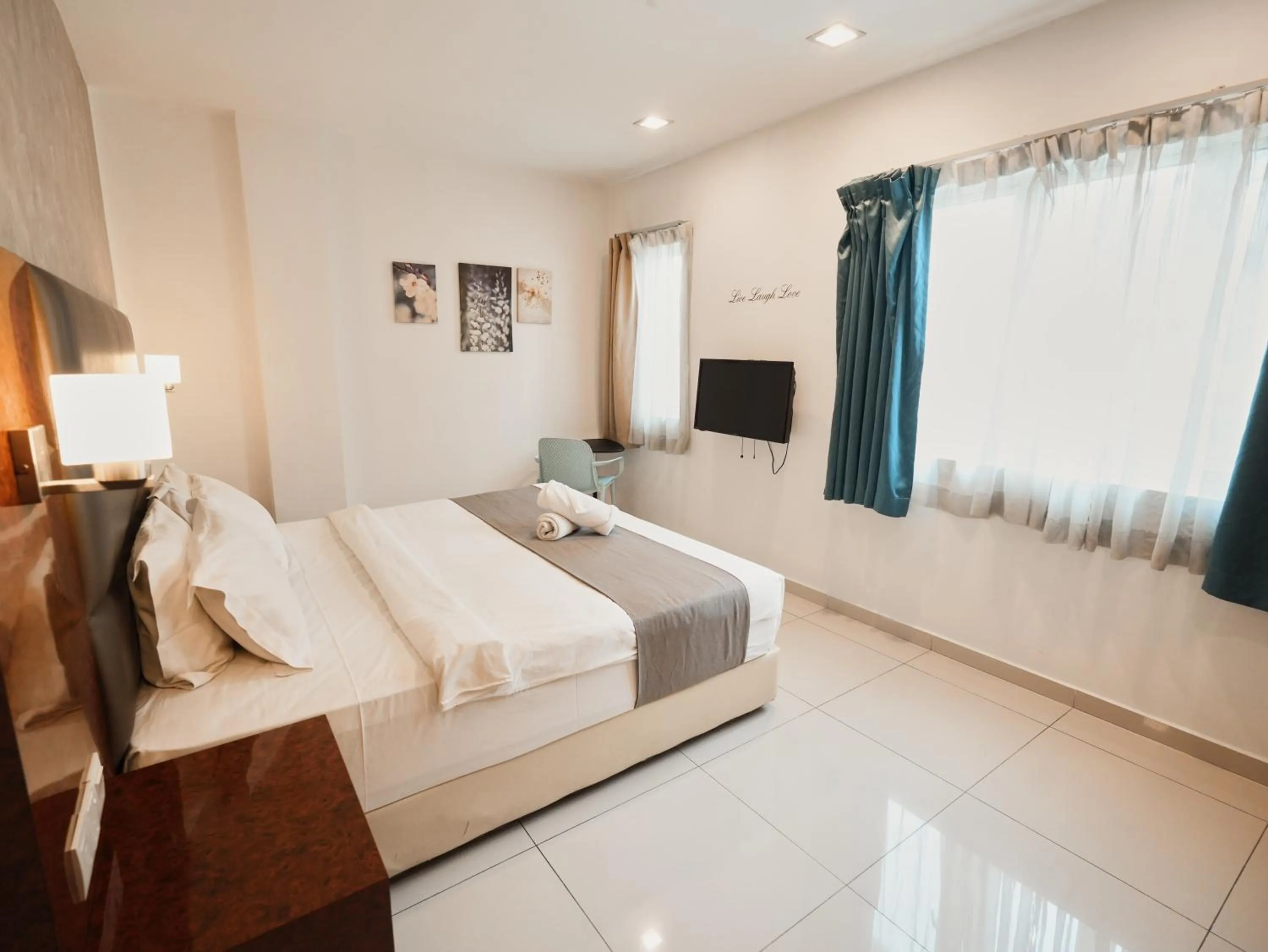 Bed in Eco Roomy Hotel