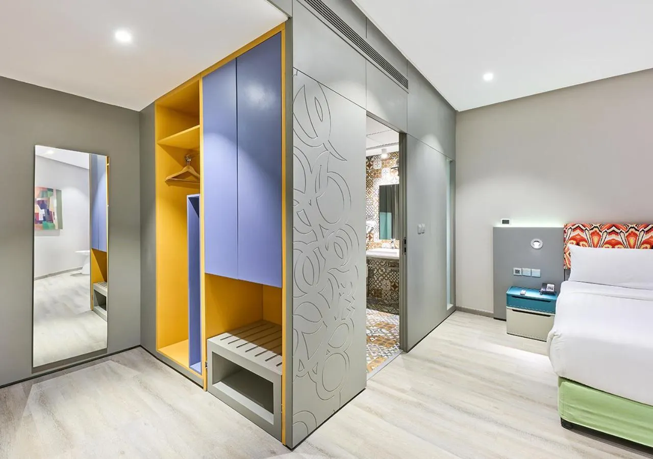 Bed in Ibis Styles Dubai Jumeira