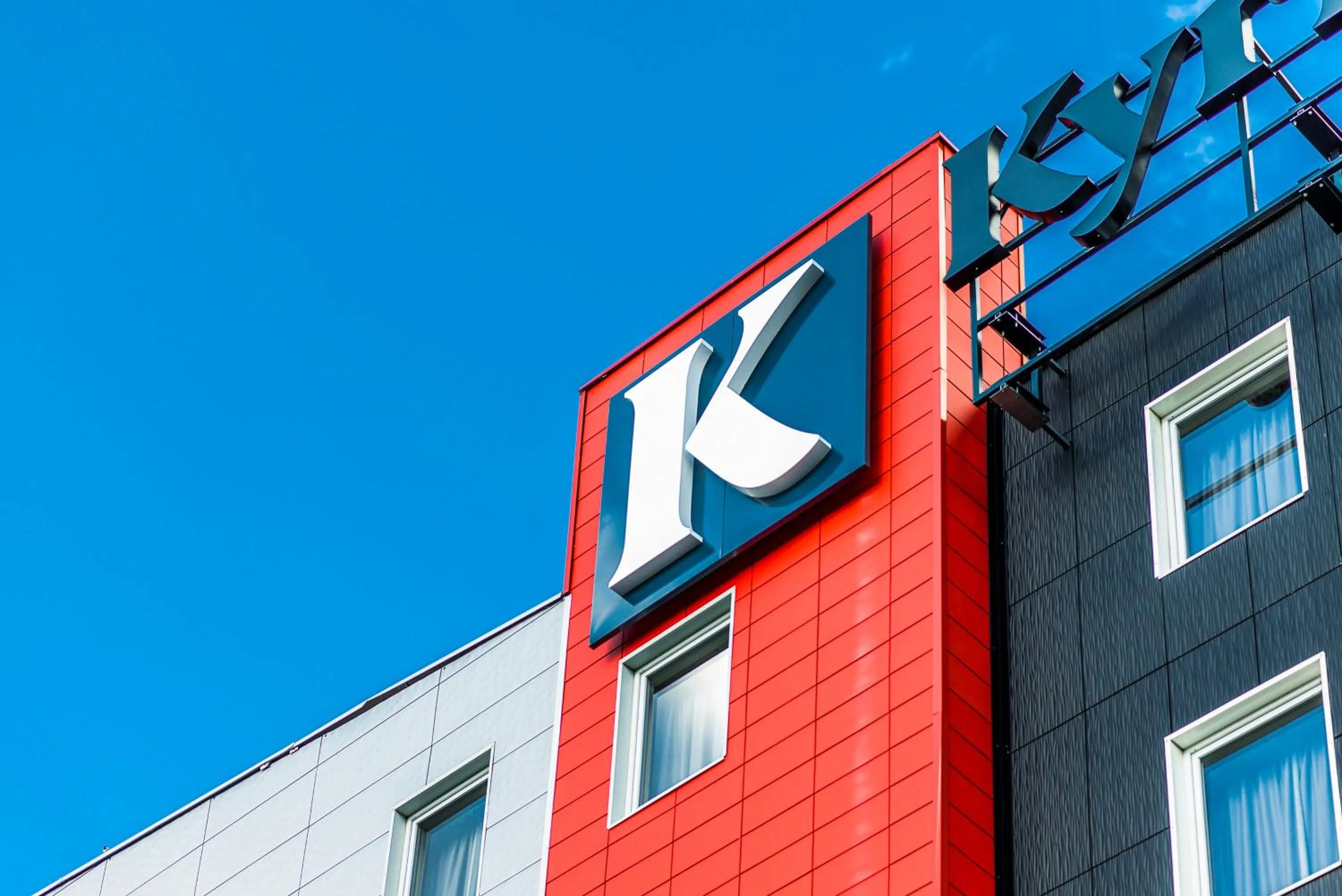 Property logo or sign in Kyriad Lyon Est Stadium Eurexpo Meyzieu