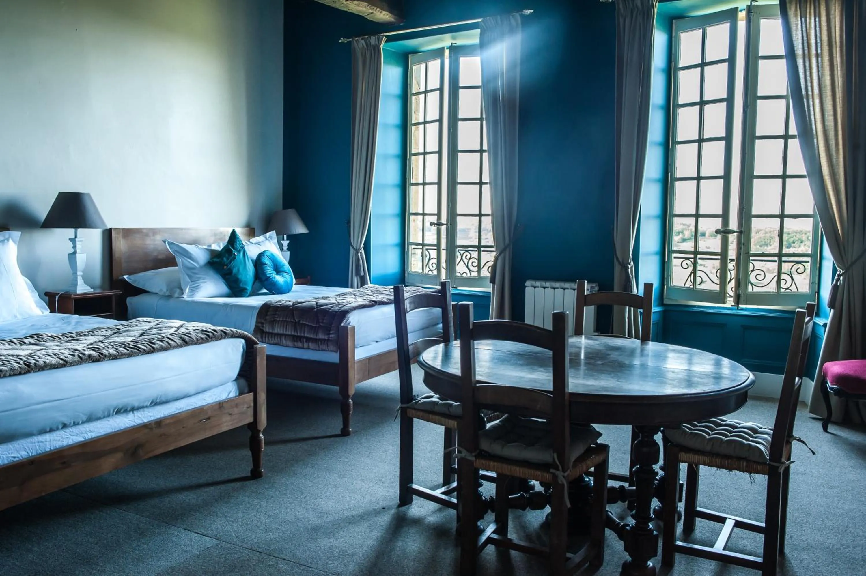 Bed in Hotel Raymond VII