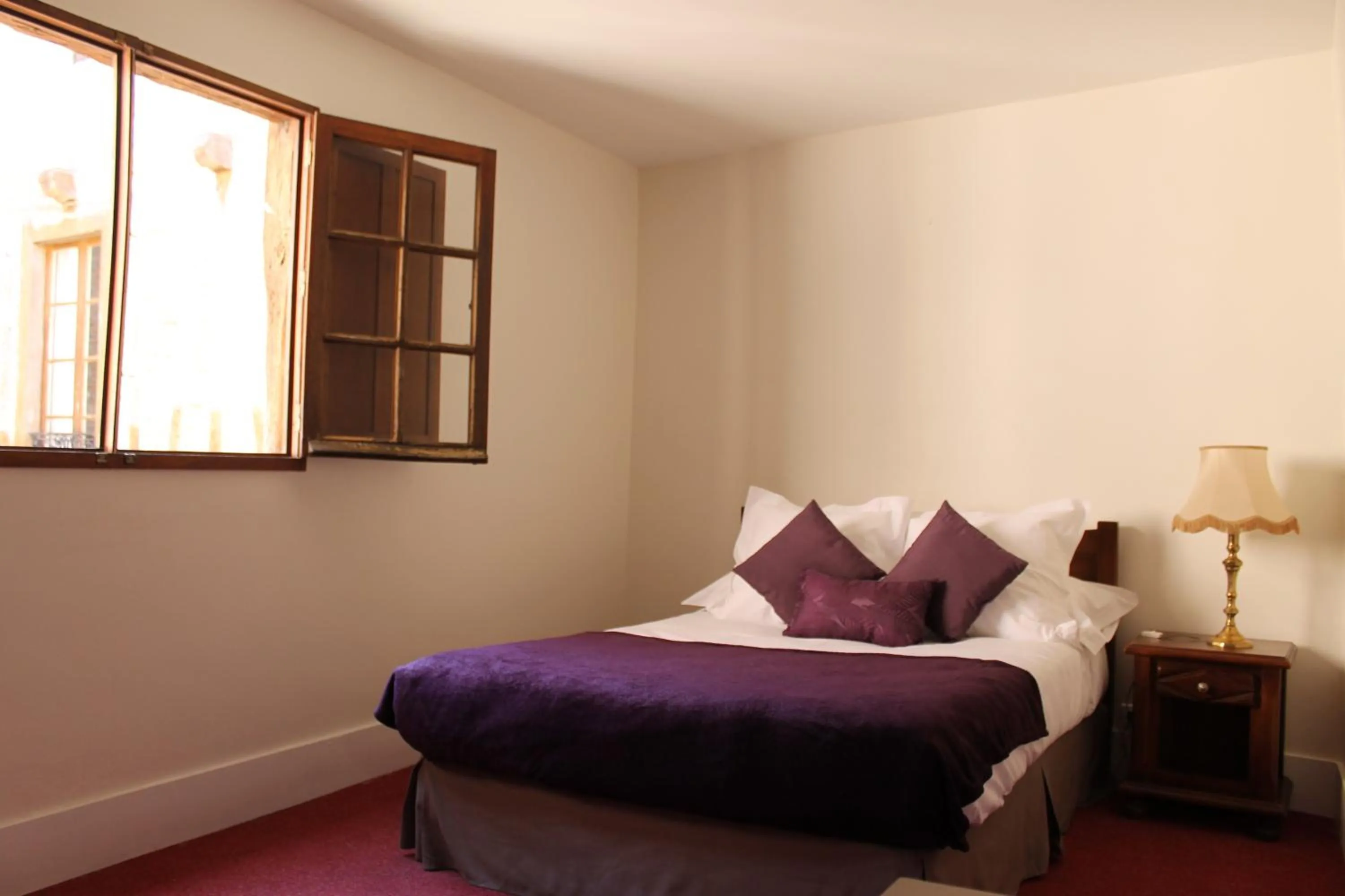 Bed in Hotel Raymond VII