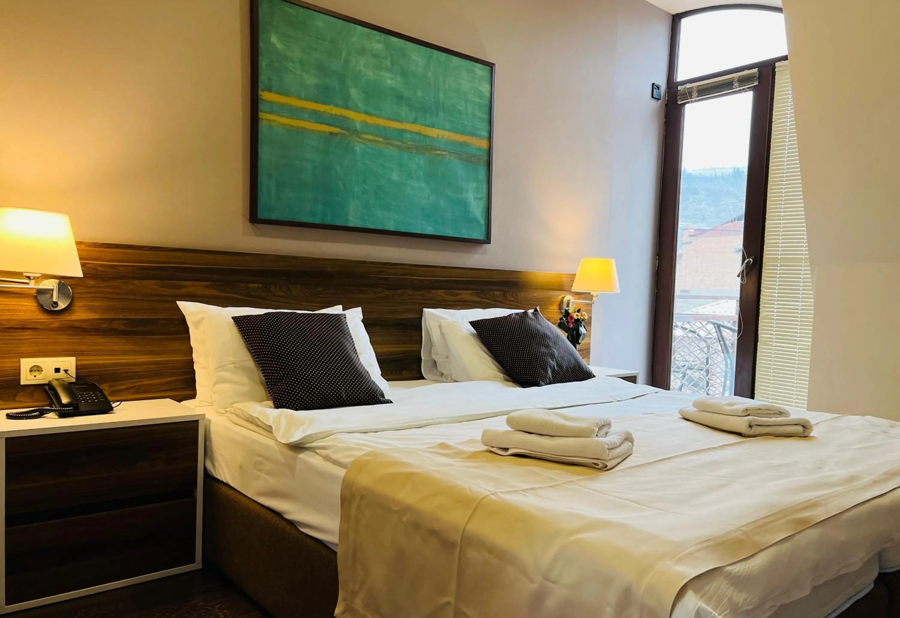 Bed in Point Hotel Tbilisi