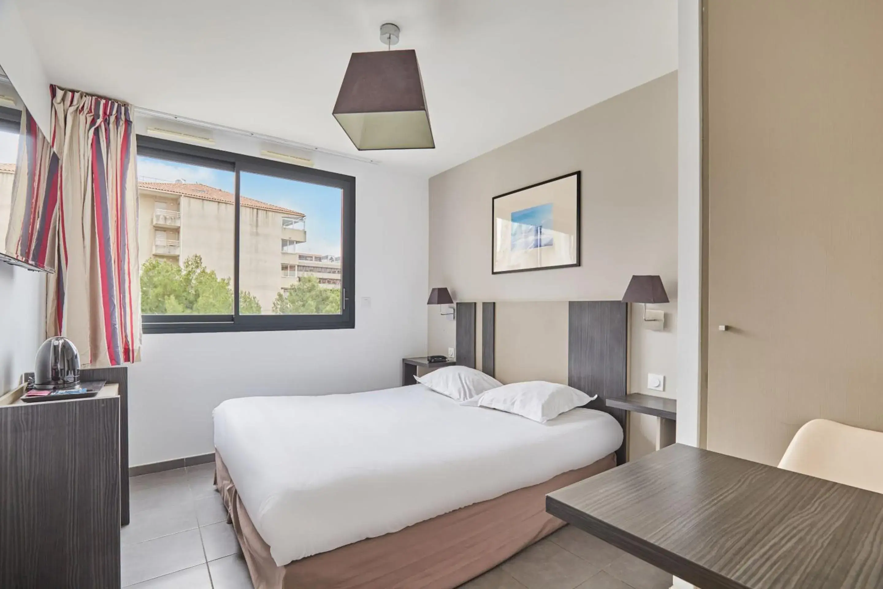 Bed in Appart'hôtel Odalys City - Marseille Prado Bed in Appart'hôtel Odalys City - Marseille Prado