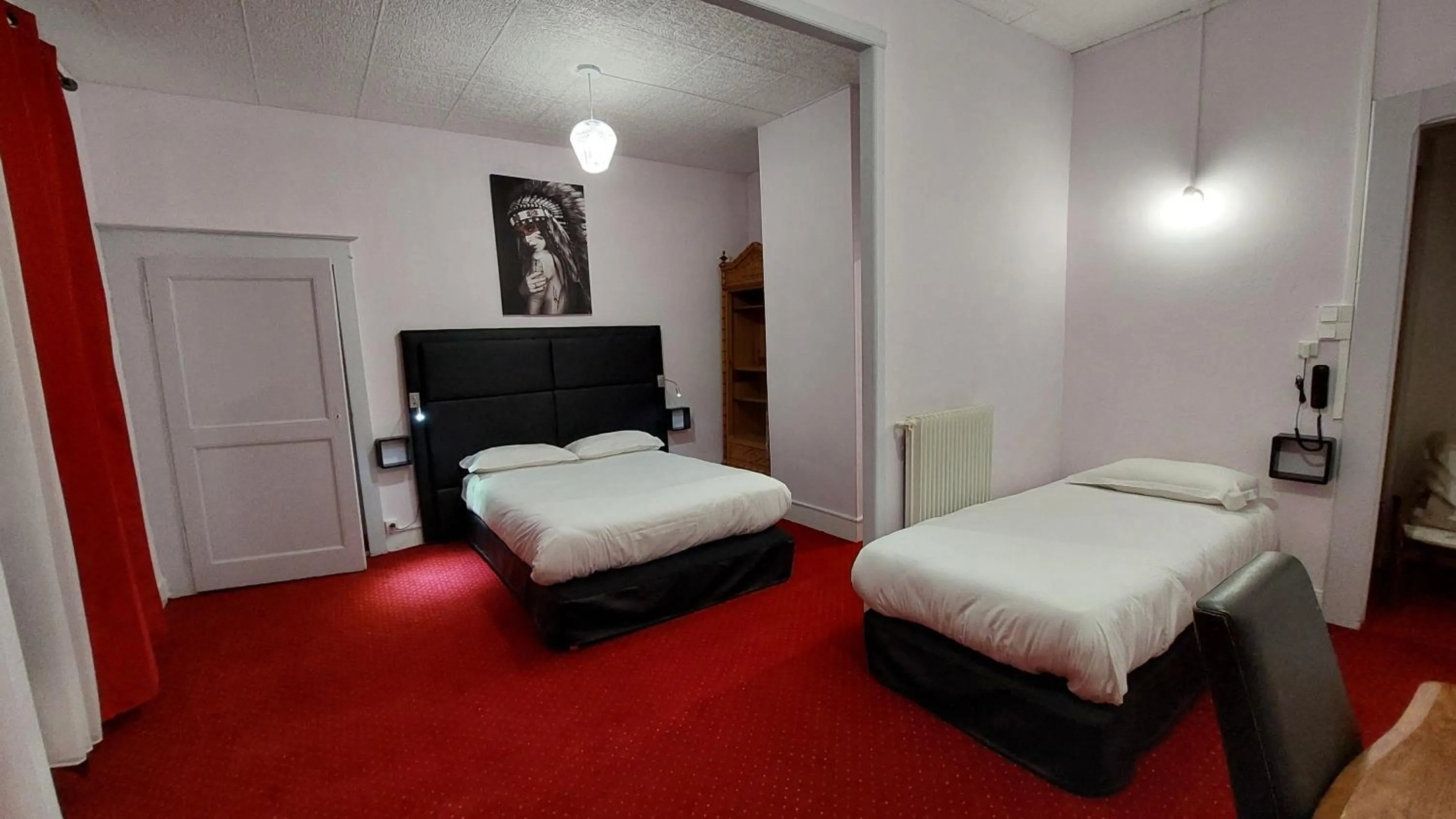 Bed in Hôtel du Palais