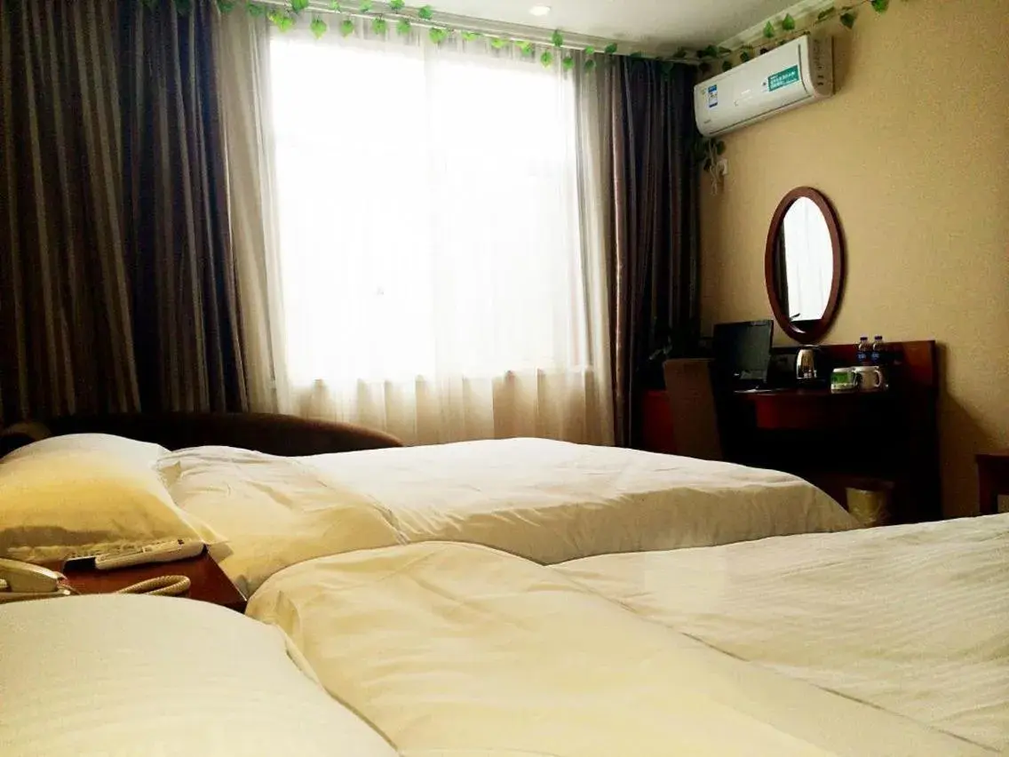 Bed in GreenTree Inn Fuyang Shopping Mall Bed in GreenTree Inn Fuyang Shopping Mall