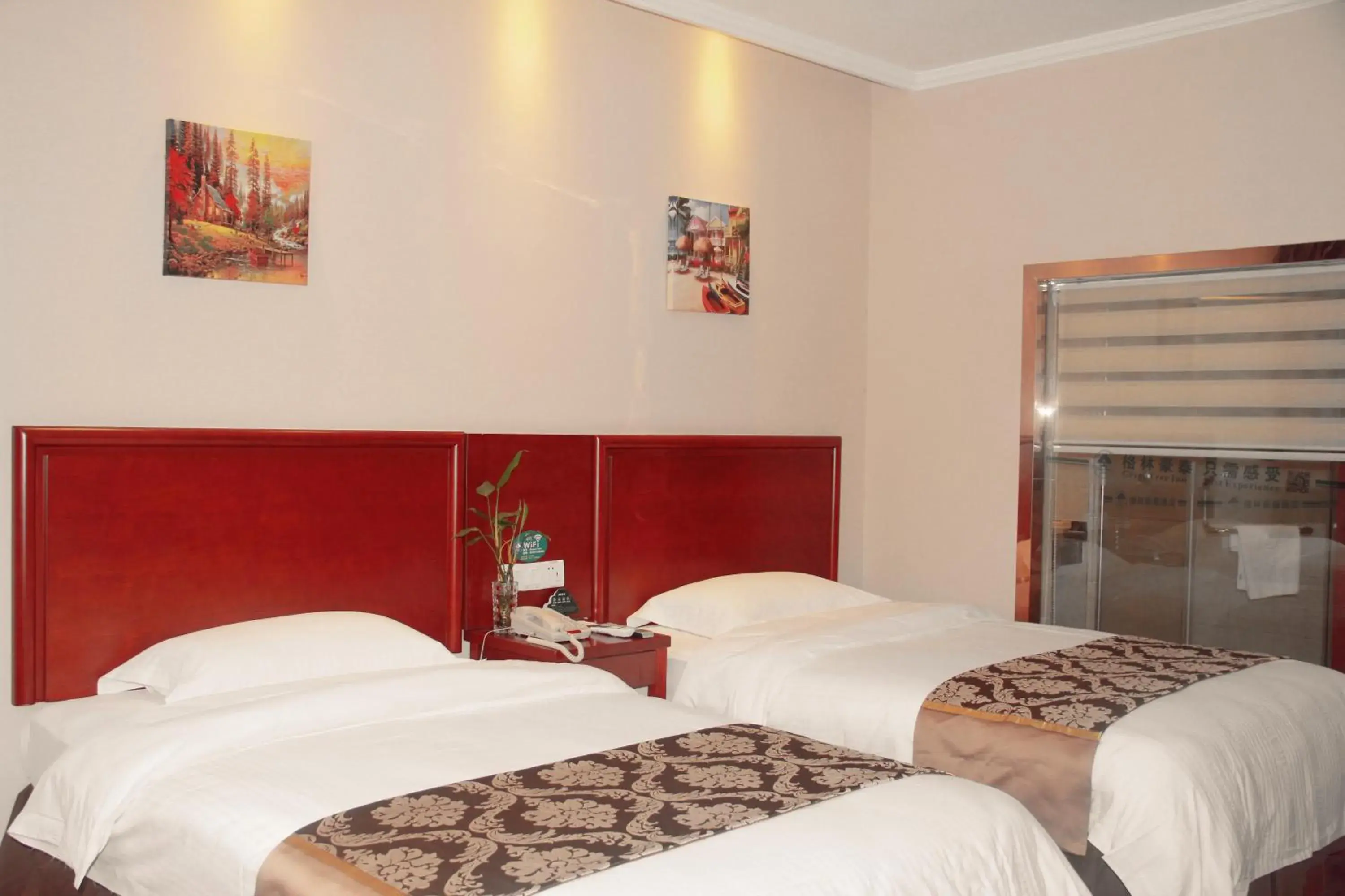 Bed in GreenTree Inn Fuyang Shopping Mall Bed in GreenTree Inn Fuyang Shopping Mall