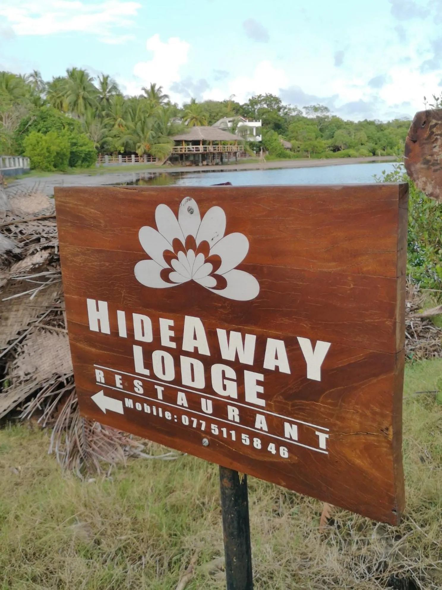 Property logo or sign in Hideaway Lodge