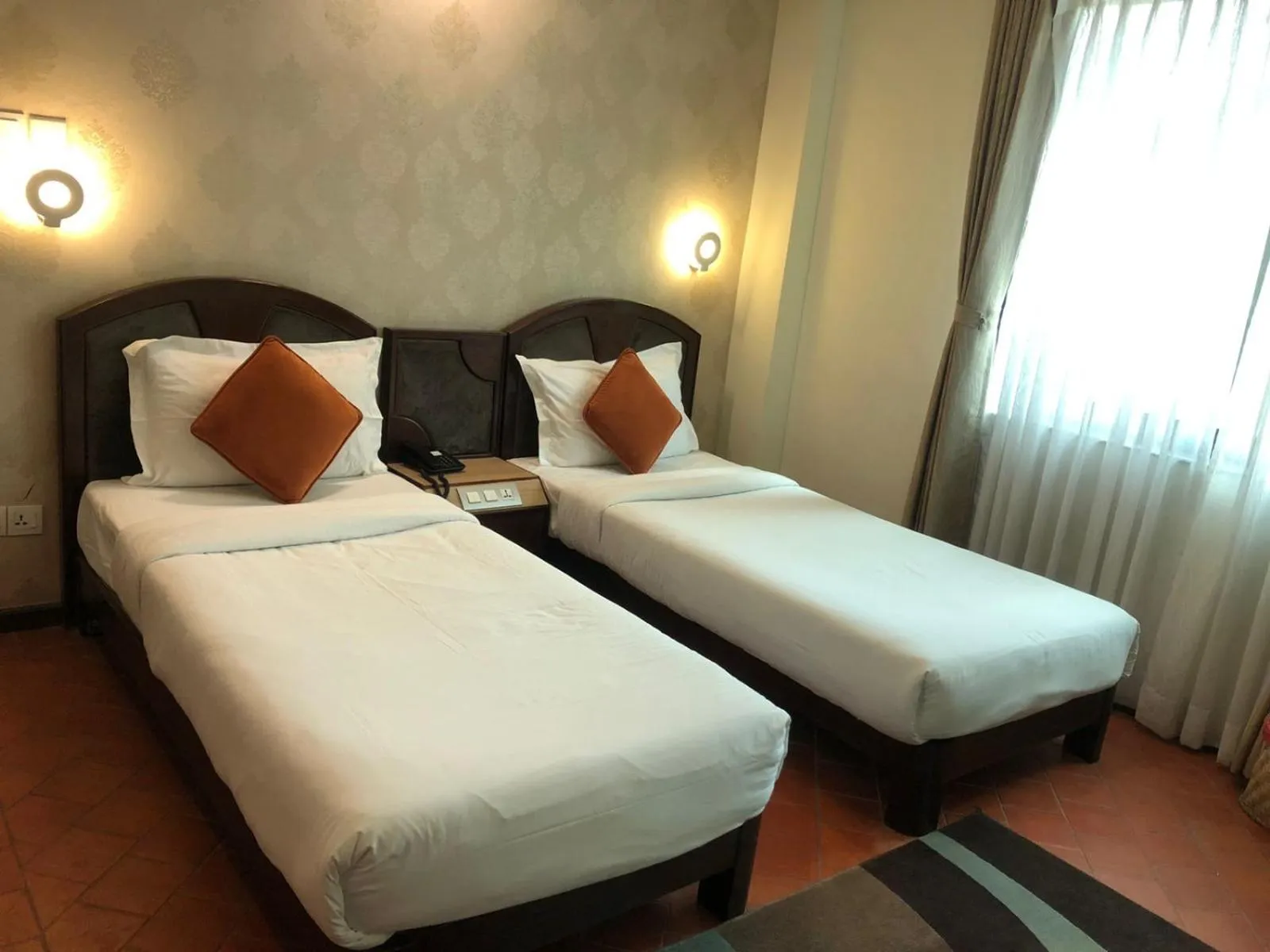 Bed in Dahlia Boutique Hotel